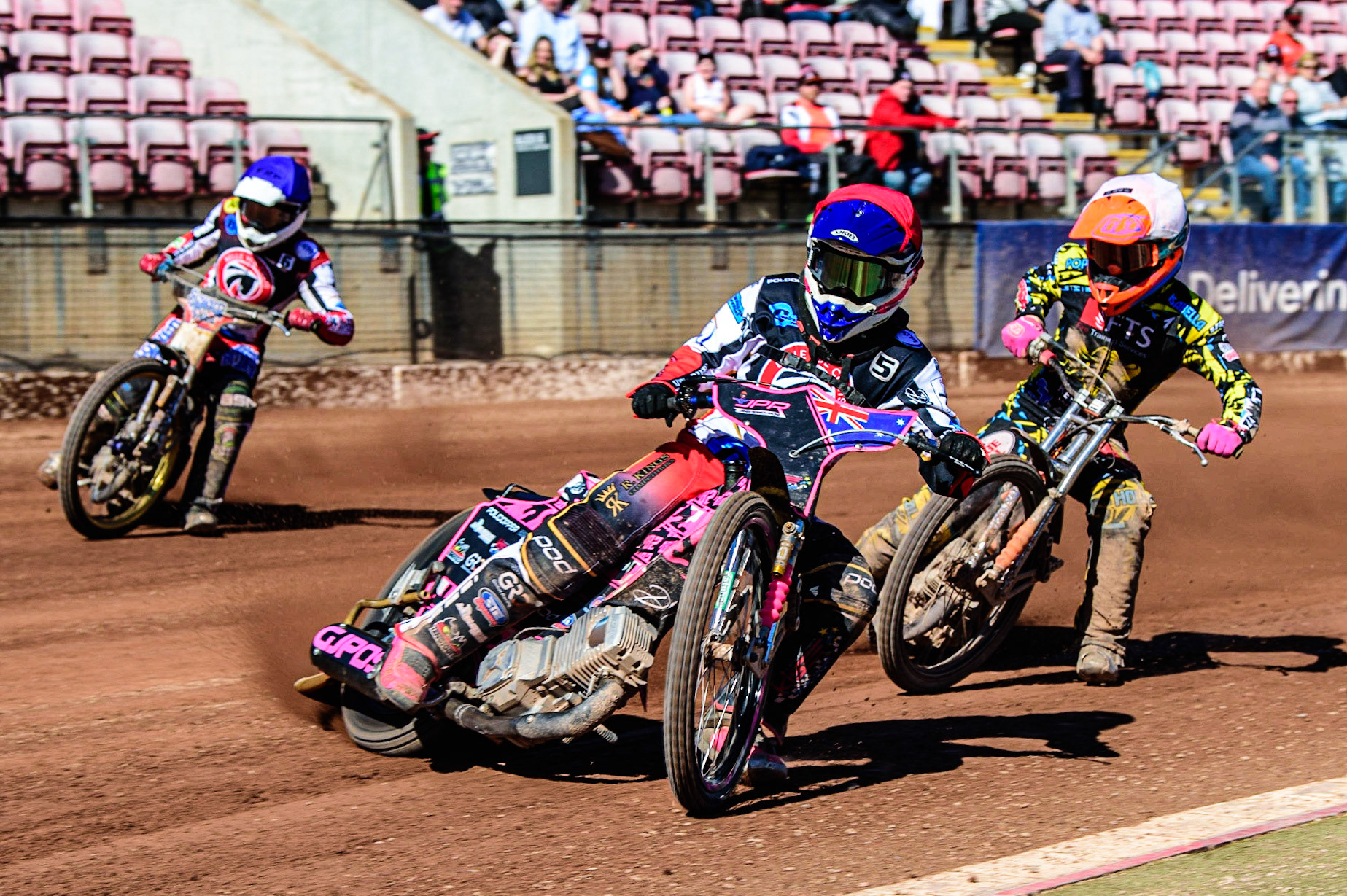 James Pearson   (Red) leads Connor Coles  (White) and Paul Bowen   (Blue) during the National Development League match between Belle Vue Colts and Berwick Bullets at the National Speedway Stadium, Manchester on Friday 7th April 2023. (Photo: Ian Charles | MI News)
