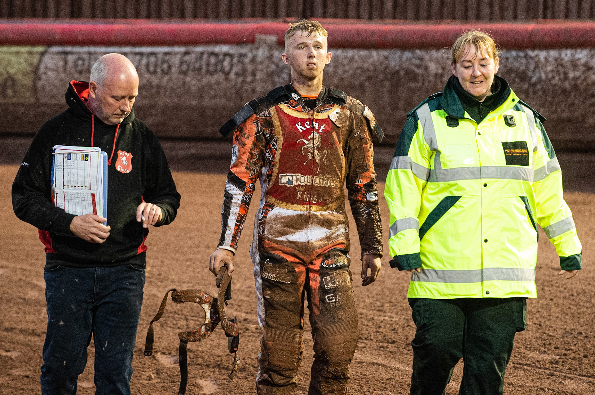 Photo: Ian Charles

Jordan Jenkins  (centre) walks back after his crash with Chris Hunt  (left) and one of the medics

Belle Vue Colts v Kent Kings, SGB National League, Belle Vue National Speedway Stadium, Manchester, Thursday 1  August  2019