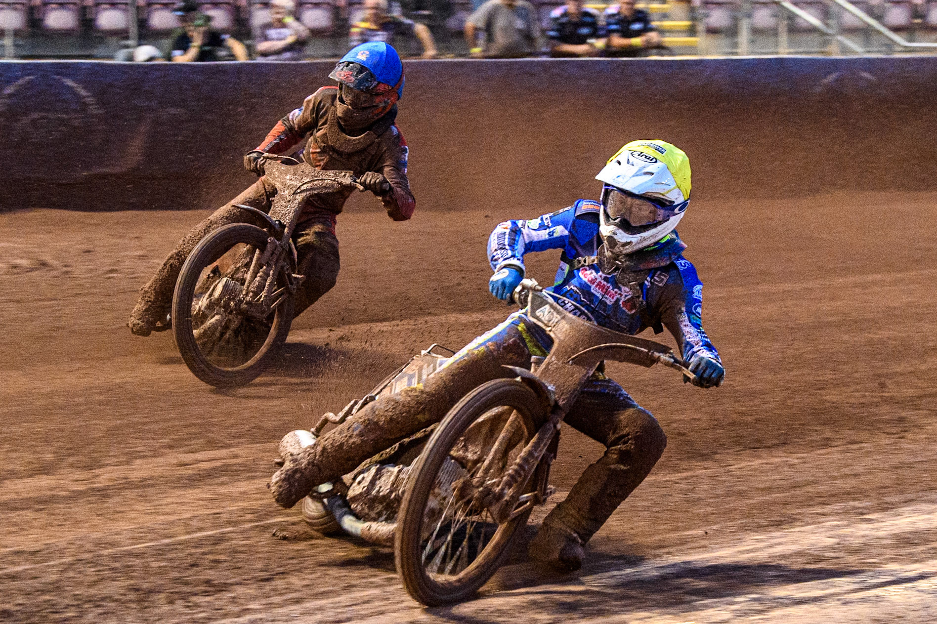 Oxford Chargers' Jody Scott  in Yellow leading Belle Vue Colts' Freddy Hodder  in Blue during the WSRA National Development League match between Belle Vue Colts and Oxford Chargers at the National Speedway Stadium, Manchester on Friday 2nd August 2024. (Photo: Ian Charles | MI News)
