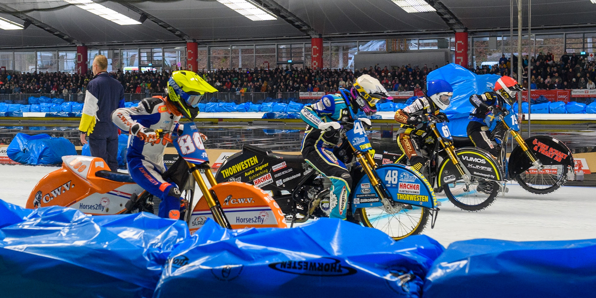 Grand Final start: (L to R) Jasper Iwema (800) of The Netherlands in Yellow, Luca Bauer (48) of Germany in White, Heikki Huusko (67) of Finland in Blue and Martin Haarahiltunen (199) of Sweden in Red during the Ice Speedway Gladiators World Championship Final 2 at Max-Aicher-Arena, Inzell on Sunday 16th March 2025. (Photo: Ian Charles | MI News)