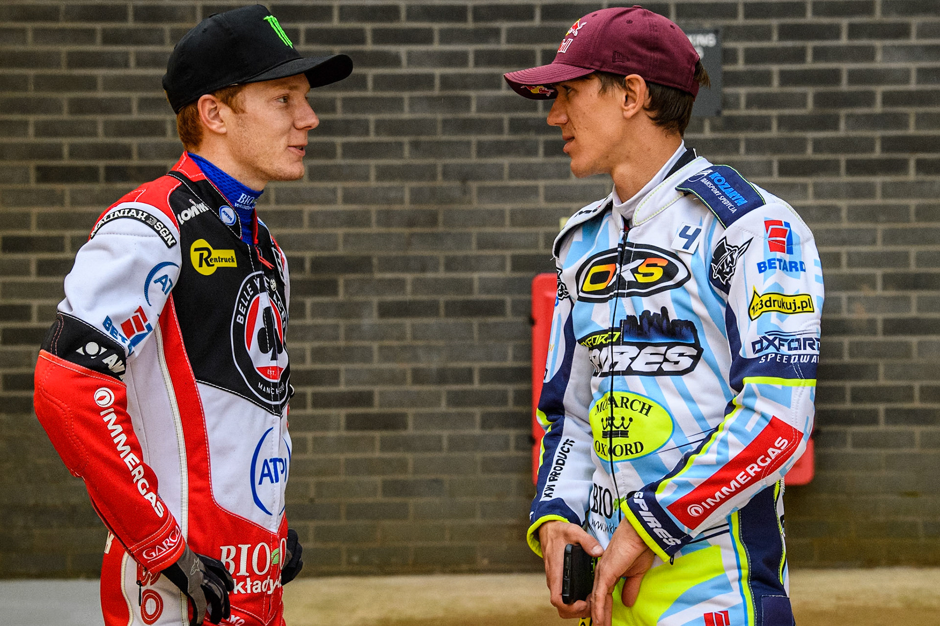 Belle Vue Aces' Dan Bewley (Left) chats with Oxford Spires' Maciej Janowski during the Rowe Motor Oil Premiership match between Belle Vue Aces and Oxford Spires at the National Speedway Stadium, Manchester on Monday 13th May 2024. (Photo: Ian Charles | MI News)