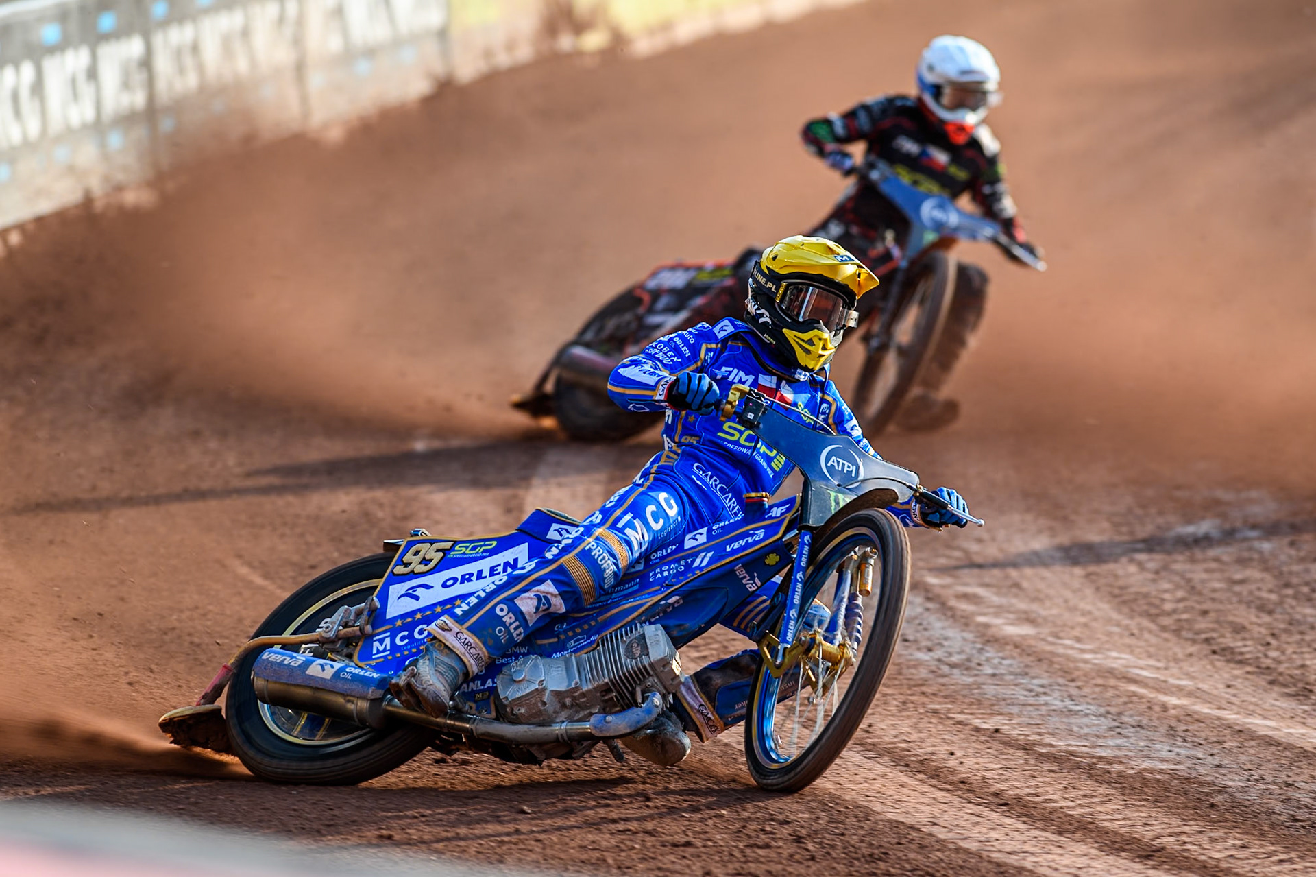 Bartosz Zmarzlik (95) of Poland in Yellow leading January Kvech (201) of Czech Republic in White during the ATPI FIM Speedway Grand Prix Round 5 at the National Speedway Stadium, Manchester, on Saturday 14th June 2025. (Photo: Ian Charles | MI News)