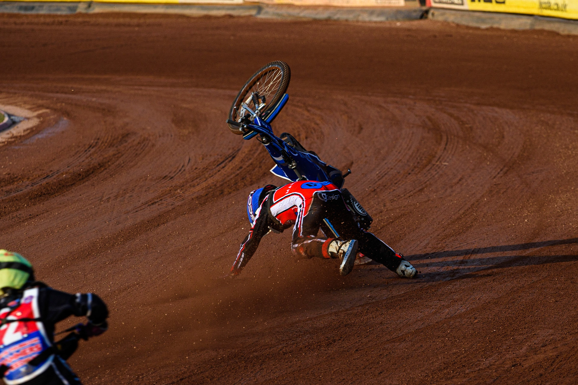 MANCHESTER, UK. JULY 23RD Harry McGurk  \loses control of his machine on the back straight during the National Development League match between Belle Vue Colts and Eastbourne Seagulls at the National Speedway Stadium, Manchester on Friday 23rd July 2021. (Credit: Ian Charles | MI News)