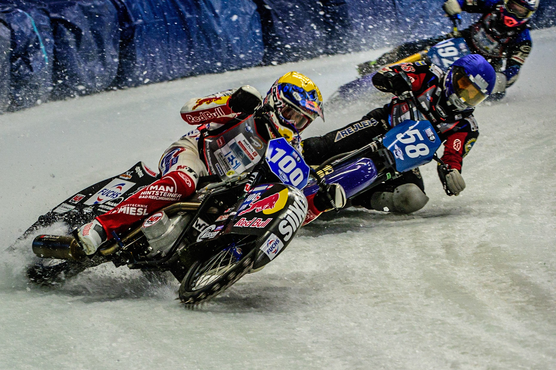 Franz Zorn (100) (Yellow) picks up outside Stefan Svensson (58) during the Ice Speedway Gladiators World Championship Final 1 at Max-Aicher-Arena, Inzell, Germany on Saturday 18th March 2023. (Photo: Ian Charles | MI News)