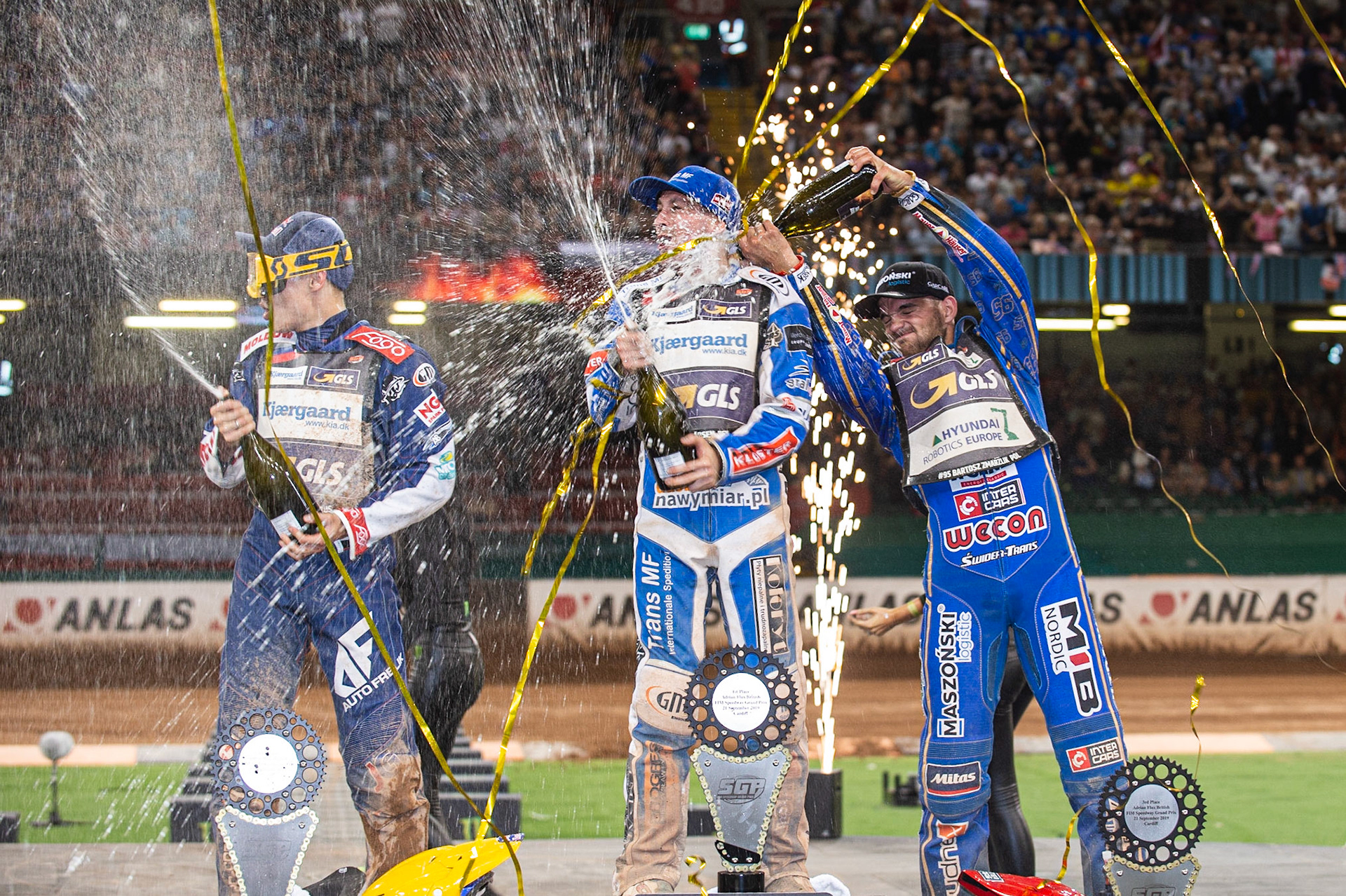 CARDIFF,WALES  Champagne capers on the rostrum during the ADRIAN FLUX BRITISH FIM SPEEDWAY GRAND PRIX at the Principality Stadium, Cardiff on Saturday 21st September 2019. (Credit: Ian Charles | MI News)