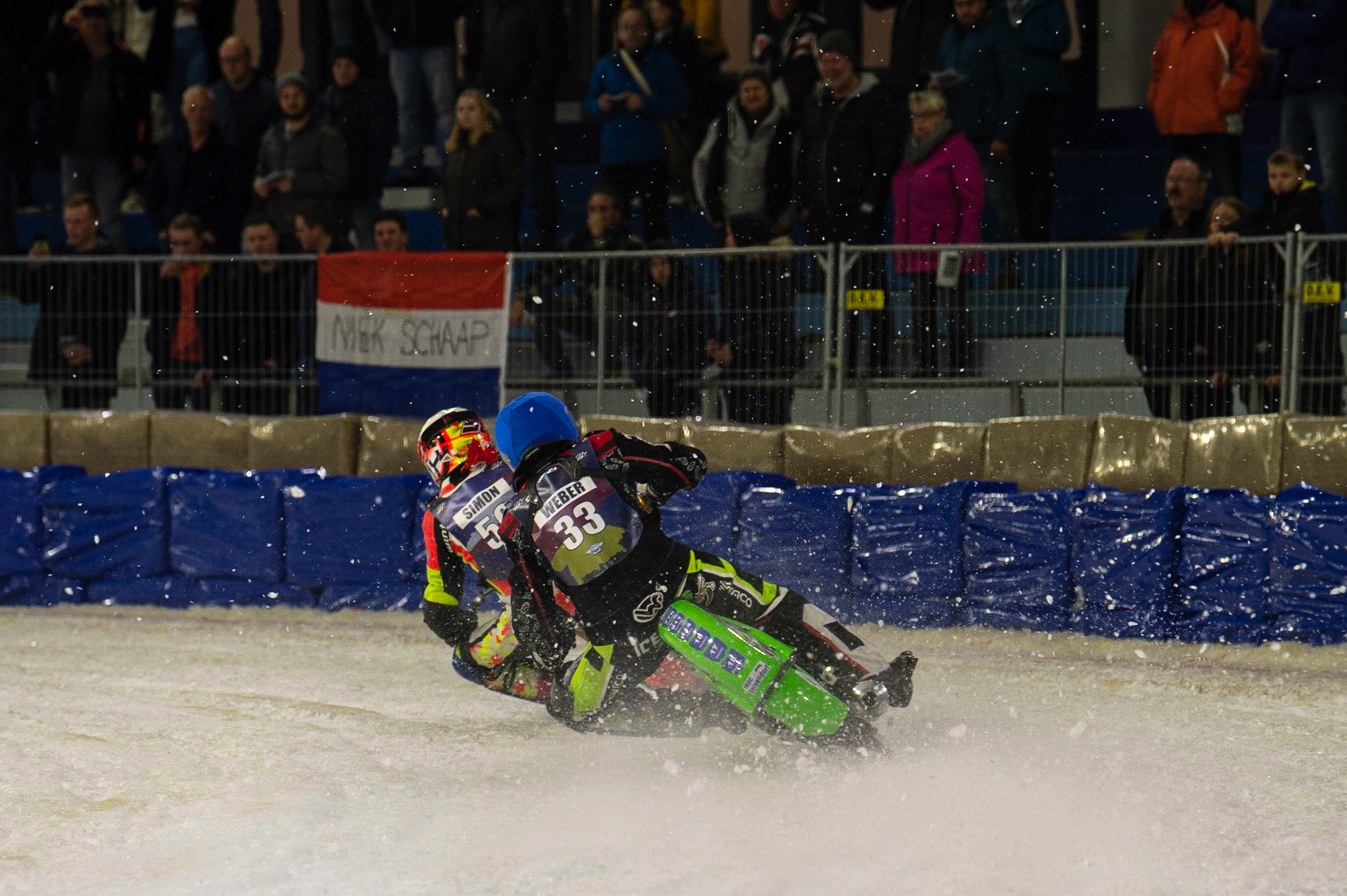 HEERENVEEN, NL. Johann Weber (33)  chases Harald Simon (50) during the FIM Ice Speedway Gladiators World Championship Final 3 at Ice Rink Thialf, Heerenveen on Saturday  2 April 2022. (Credit: Ian Charles | MI News)