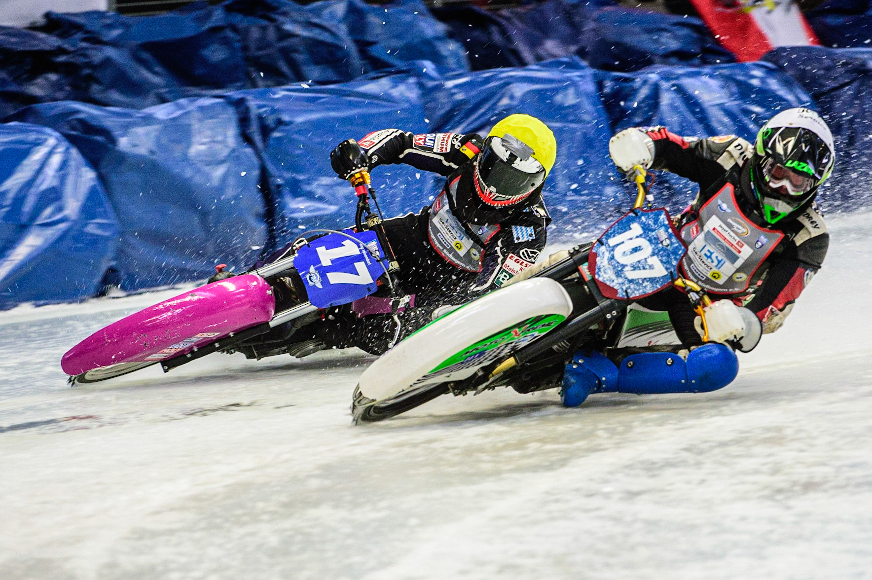 Andrej Divis (107) (White) inside Benedikt Monn (17) (Yellow) during the Ice Speedway Gladiators World Championship Final 2 at Max-Aicher-Arena, Inzell, Germany on Sunday 19th March 2023. (Photo: Ian Charles | MI News)