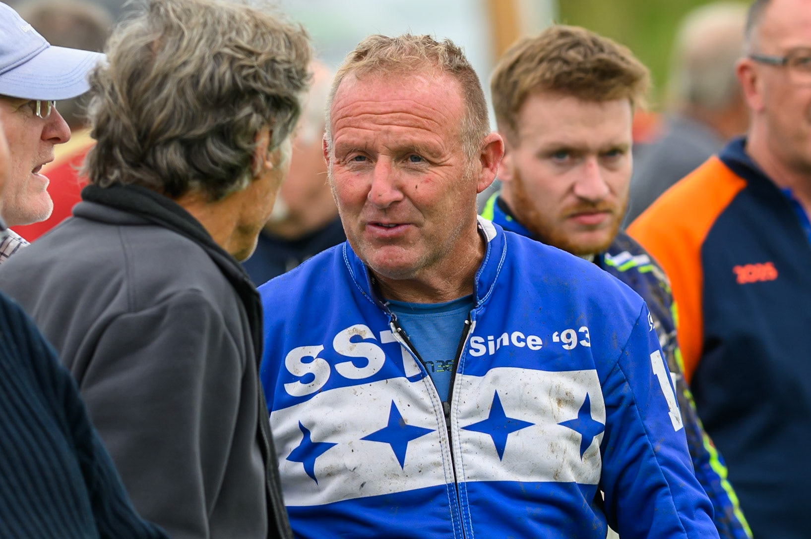 Tony Atkin (10) (Centre - Blue Kevlars) in conversation with fans during the British Masters Grasstrack Championship at Lower Marsh Farm, Much Hoole, Preston in Lancashire, England on Sunday 13th September 2026. (Photo: Ian Charles | MI News)