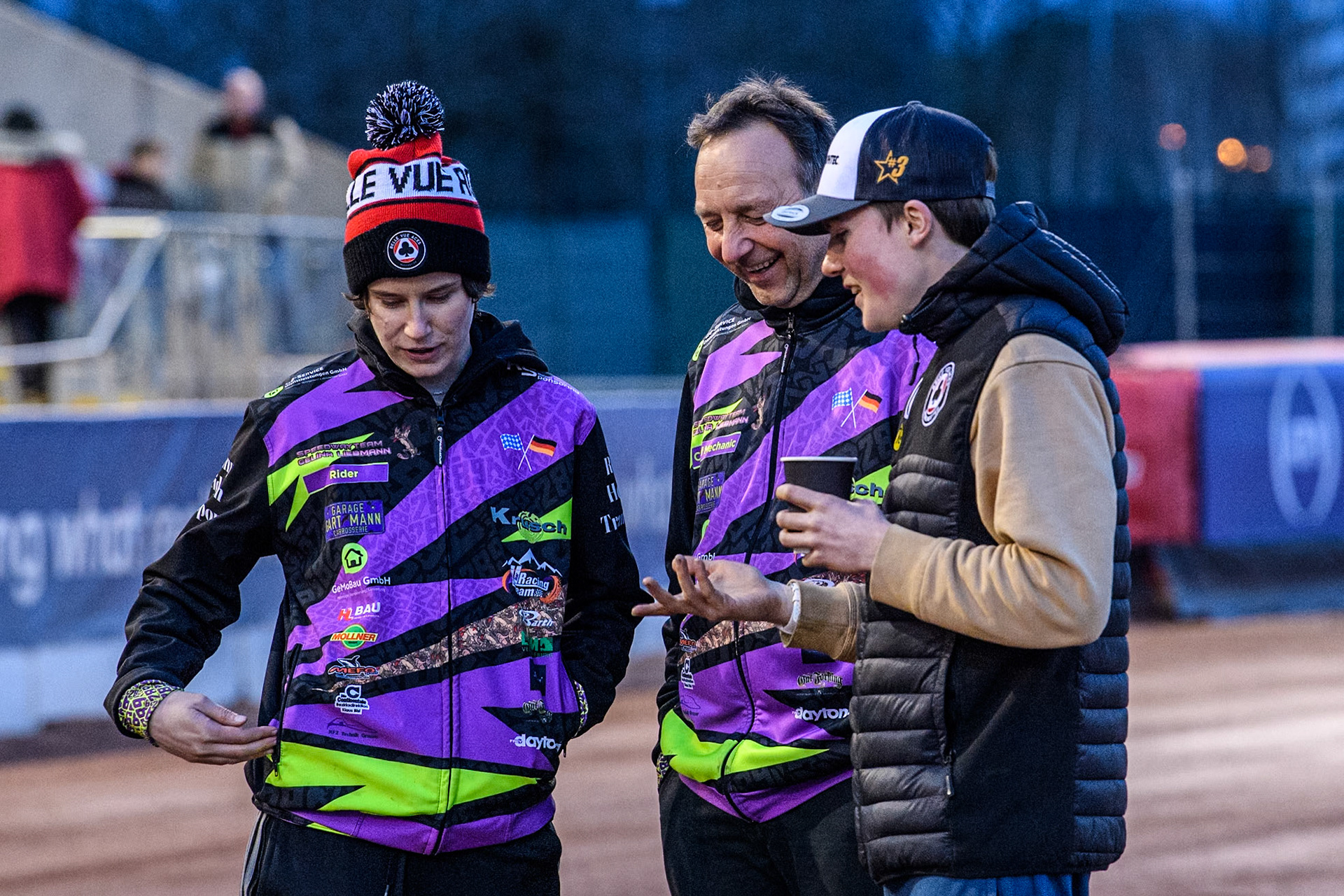 (L to R) Germany's Celina Liebmann, her Father Jürgen, and Germany's Norick Blödorn during the Peter Craven Memorial Trophy meeting at the National Speedway Stadium, Manchester on Monday 18th March 2024. (Photo: Ian Charles | MI News)