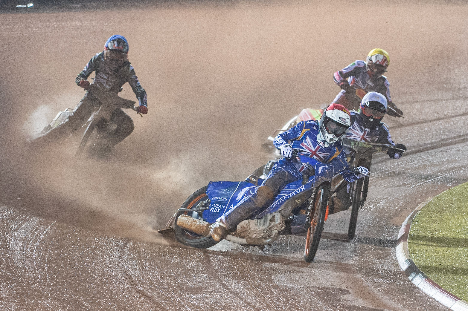 Photo: Ian CharlesLewis Kerr (Red) leads the opening heat from Danny King   (White)  Drew Kemp   (Blue)  and Ben Woodhull  (Yellow)  Sports Insure British Speedway Championship Final, National Speedway Stadium, Manchester Monday  28  September  2020