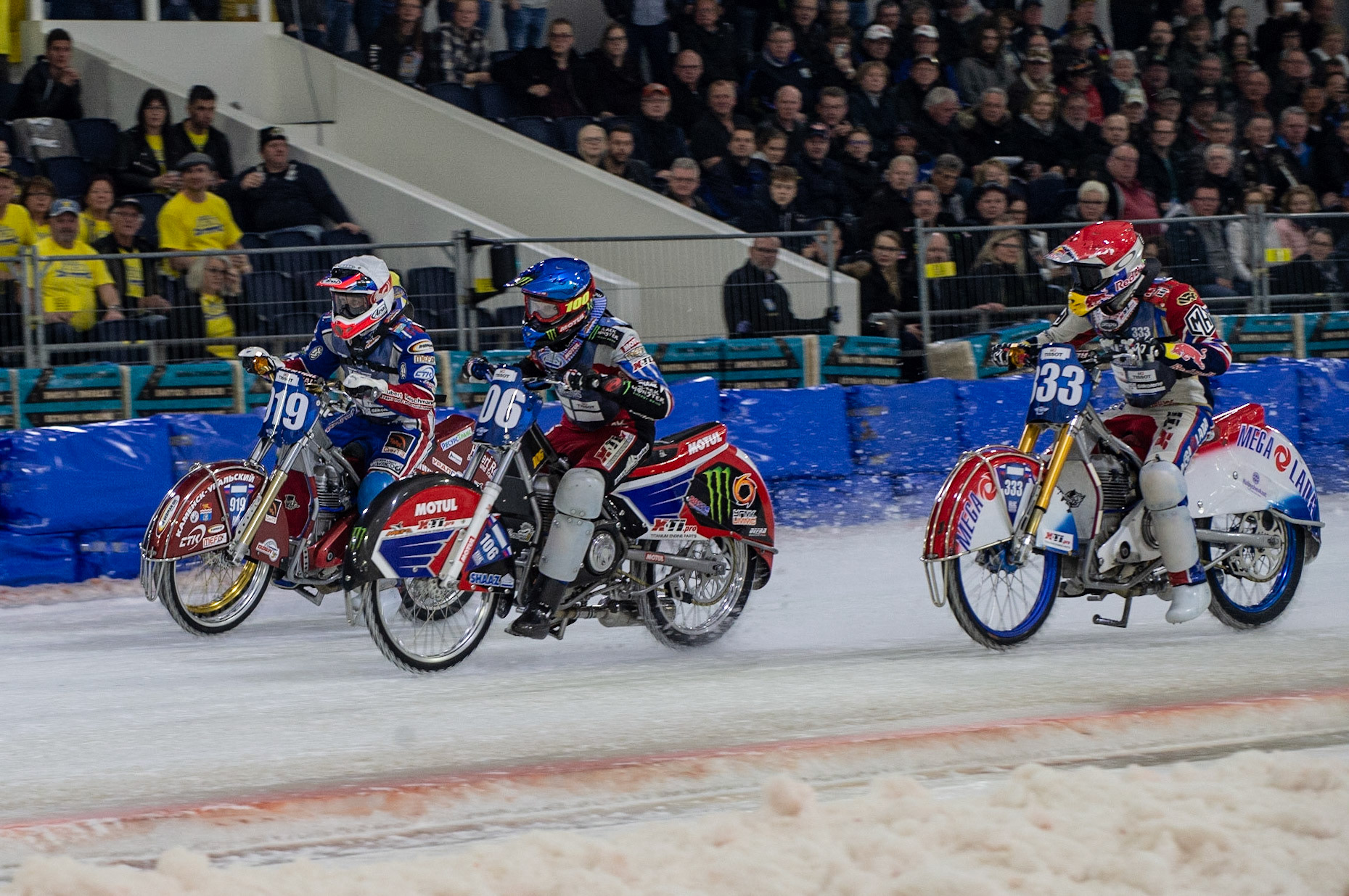 Photo: Ian Charles

Dmitri Khomitsevich (919) and Dmitri Koltakov (106) lead Danil Ivanov (333) in the final on Saturday

FIM Ice Speedway Gladiators World Championship, Event 5.1, Ice Rink Thialf, Heerenveen, Netherlands Saturday  30  March  2019