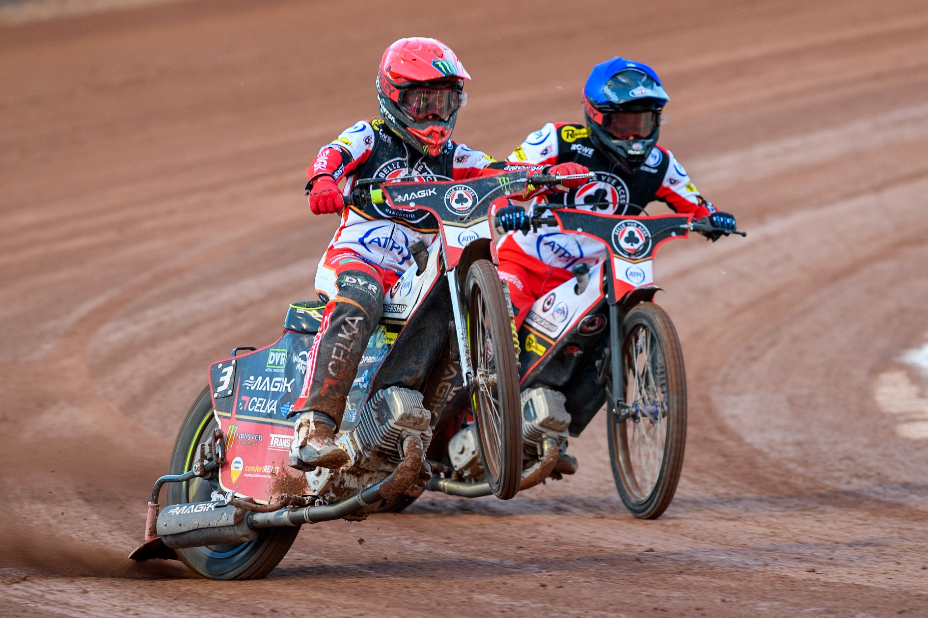 Belle Vue Aces' Jaimon Lidsey in Red starts to rear ahead of team mate Zach Cook in Blue during the Rowe Motor Oil Premiership match between Belle Vue Aces and Leicester Lions at the National Speedway Stadium, Manchester on Monday 19th May 2025. (Photo: Ian Charles | MI News)