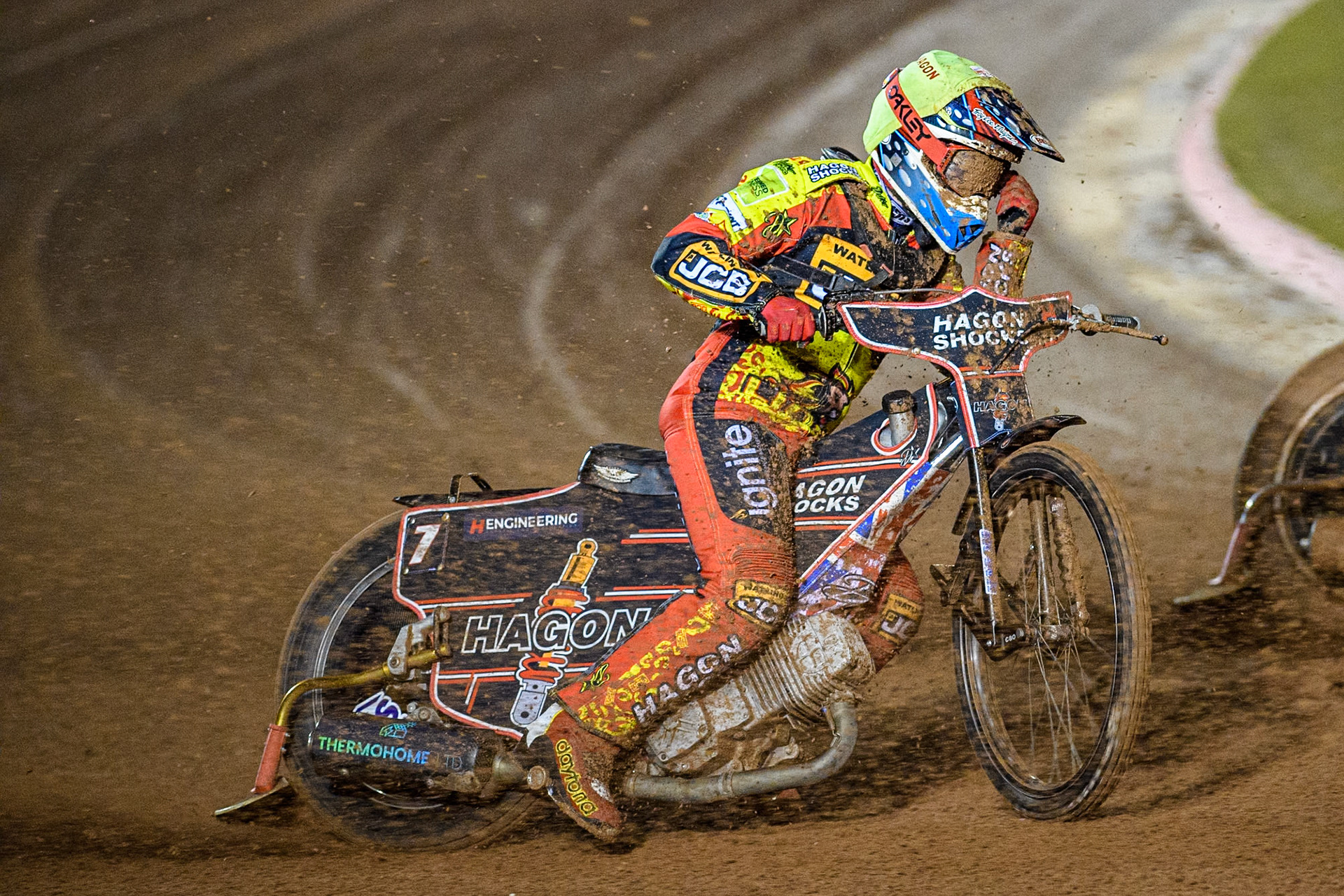 Leicester Lions' Sam Hagon pulls off his googles as he gets filled in during the Rowe Motor Oil Premiership Grand Final 1st Leg between Belle Vue Aces and Leicester Lions at the National Speedway Stadium, Manchester on Monday 23rd September 2024. (Photo: Ian Charles | MI News)