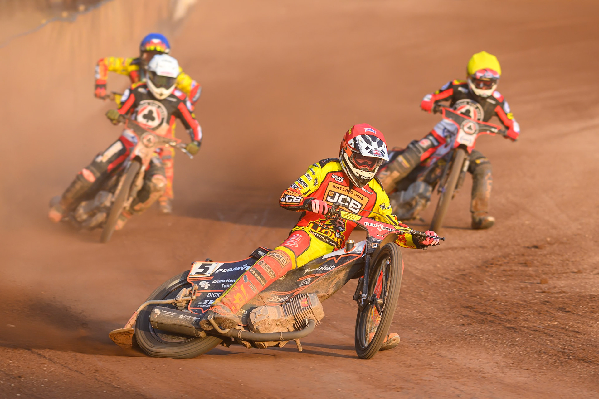 Sam Masters of Leicester Lions  in Red leading Peter Kildemand of Belle Vue Aces in White , Zach Cook of Belle Vue Aces  in Yellow and Drew Kemp of Leicester Lions  in Yellow during the Rowe Motor Oil Premiership match between Leicester Lions and Belle Vue Aces at the Hydroscan Arena, Leicester on Thursday 23rd July 2026. (Photo: Ian Charles | MI News)
