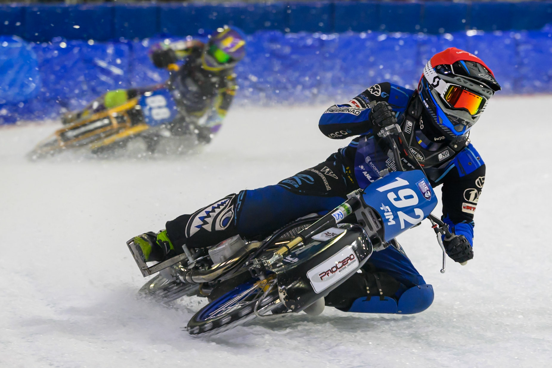 Niclas Svensson (192) of Sweden  in Red leading \99\ in Blue during the FIM Ice Speedway Gladiators World Championship Final 3 at Ice Rink Thialf, Heerenveen on Saturday 11th April 2026. (Photo: Ian Charles | MI News)