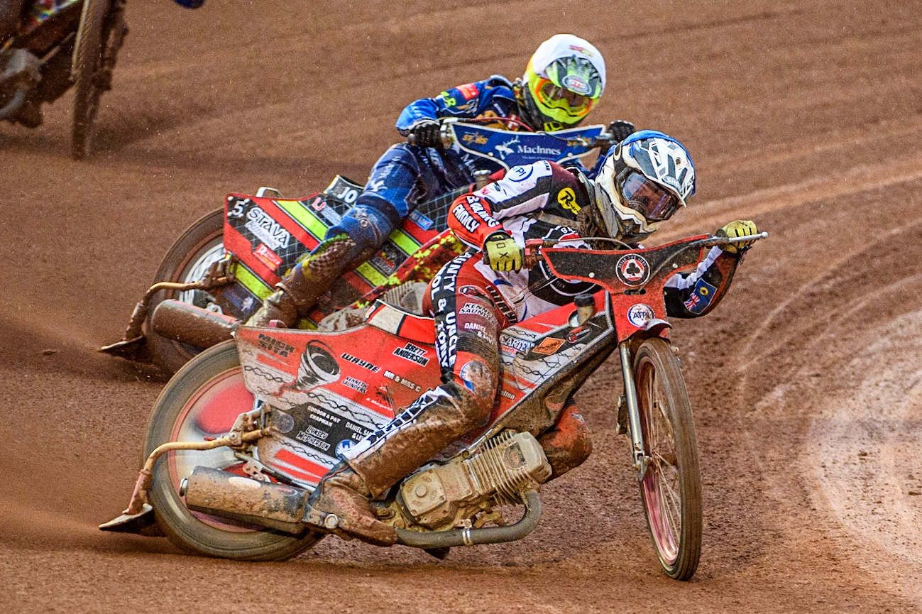 Connor Bailey (Blue) leads Michael Palm Toft (White)  during the Sports Insure Premiership match between Belle Vue Aces and King's Lynn Stars at the National Speedway Stadium, Manchester on Monday 21st August 2023. (Photo: Ian Charles | MI News)