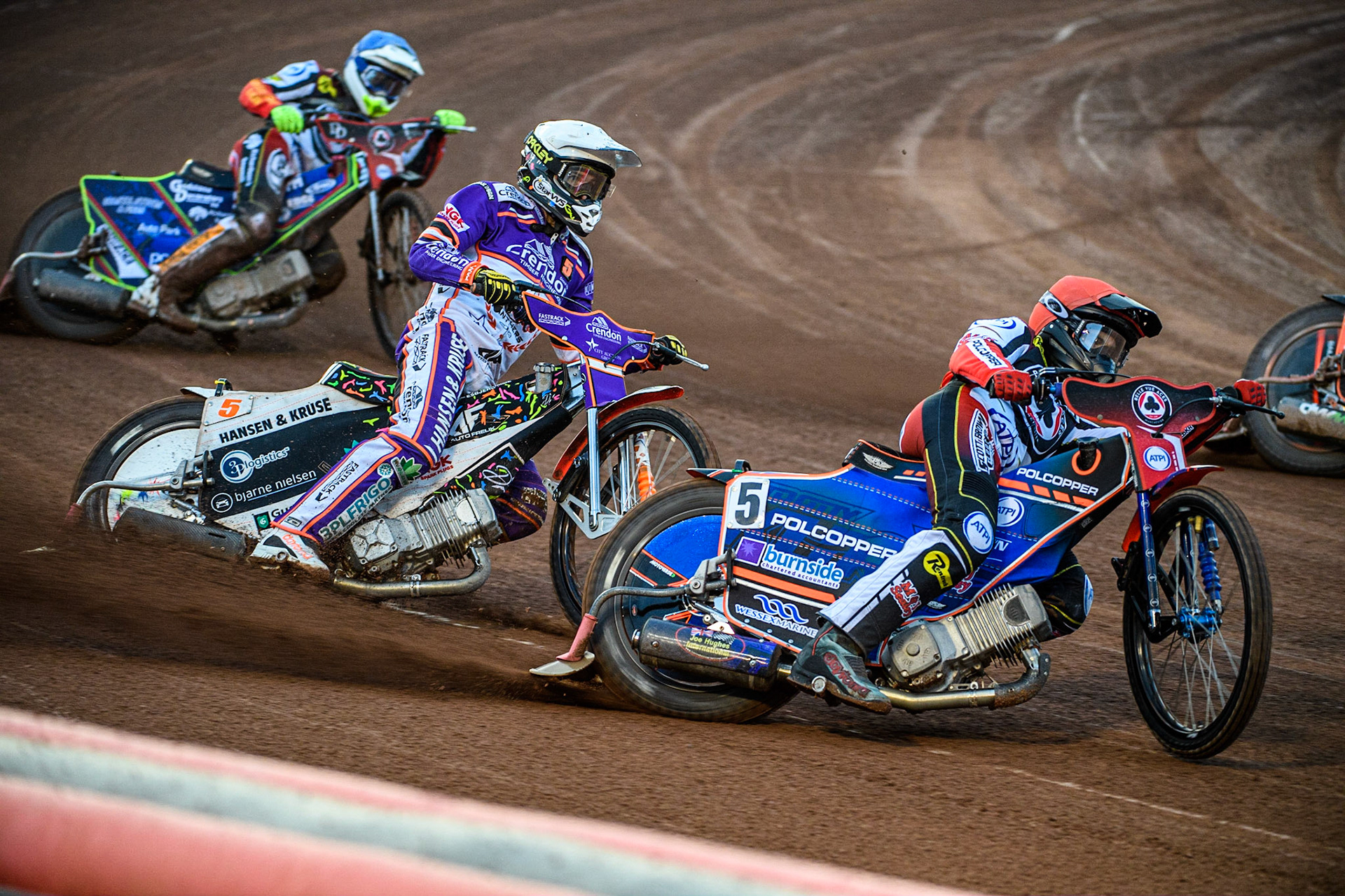 Brady Kurtz  (Red) leads Niels-Kristian Iversen  (White) and Jake Mulford  (Blue) during the SGB Premiership match between Belle Vue Aces and Peterborough at the National Speedway Stadium, Manchester on Monday 24th April 2023. (Photo: Ian Charles | MI News)