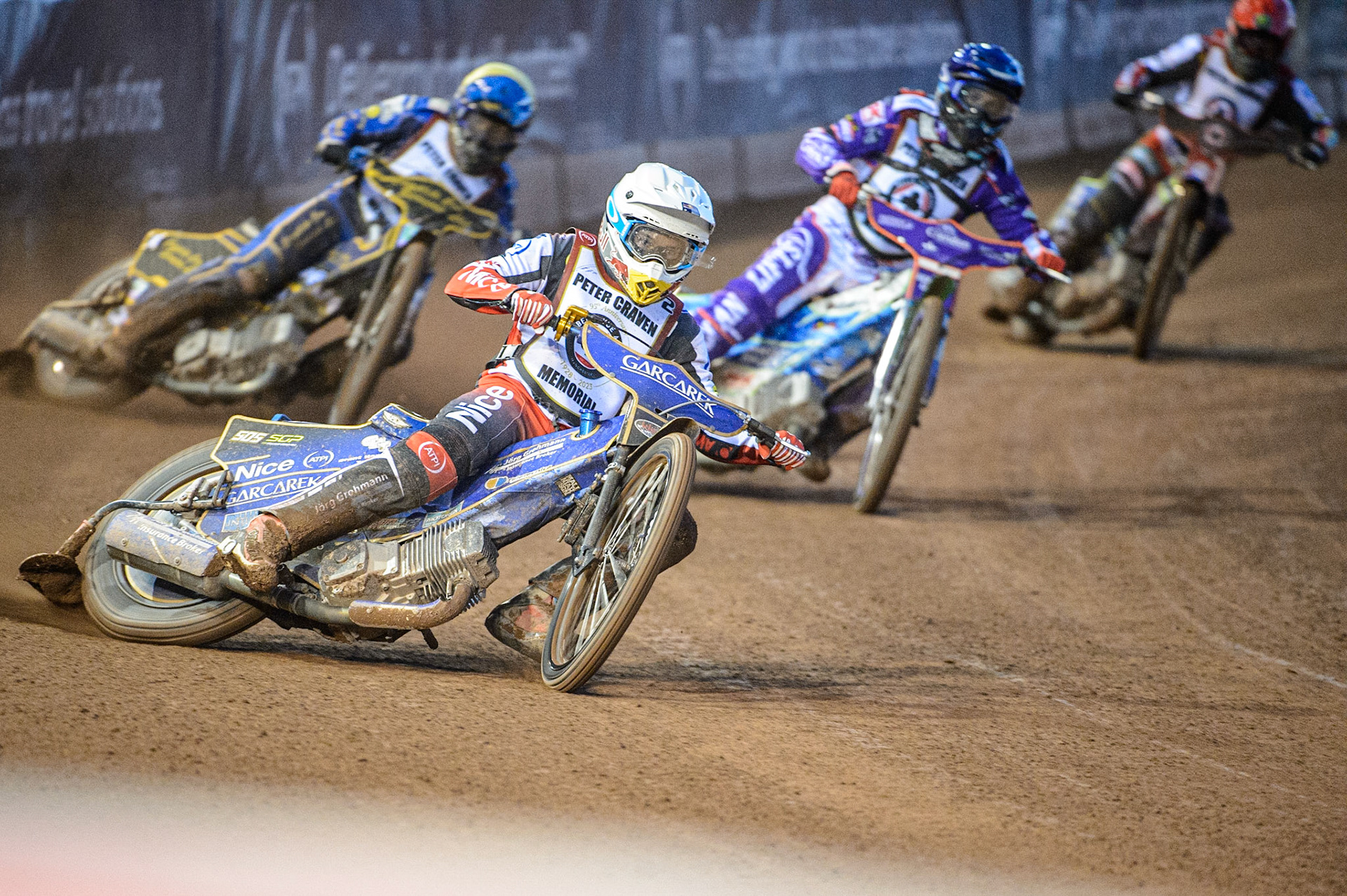 Robert Lambert  (White) leads Hans Andersen  (Blue) Kyle Howarth  (Yellow) and Jaimon Lidsey  (Red) during the Peter Craven Memorial Trophy  at the National Speedway Stadium, Manchester on Monday 3rd April 2023. (Photo: Ian Charles | MI News)