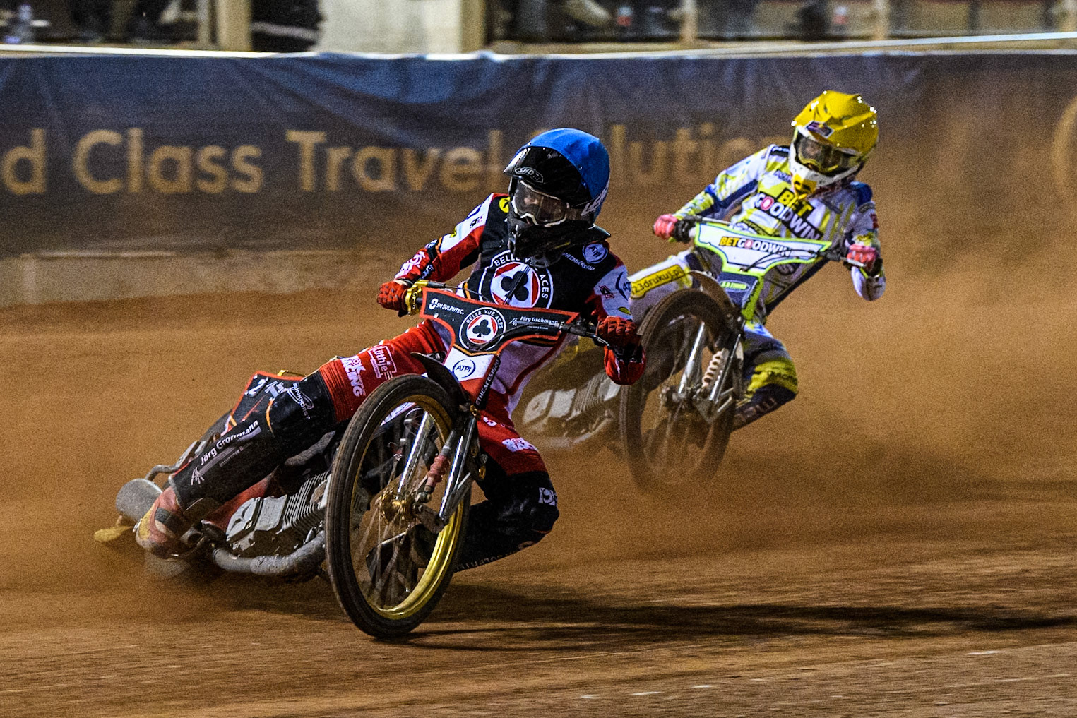 Belle Vue Aces' Norick Blodorn in Blue leading Oxford Spires' Maciej Janowski in Yellow during the Rowe Motor Oil Premiership match between Belle Vue Aces and Oxford Spires at the National Speedway Stadium, Manchester on Monday 14th April 2025. (Photo: Ian Charles | MI News)