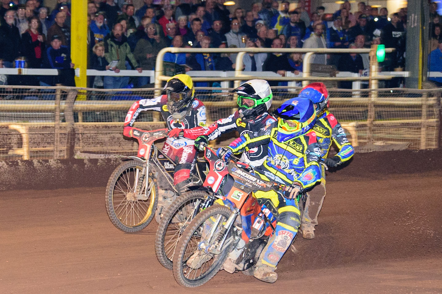SHEFFIELD, UK. APR 14TH  Stefan Nielsen   (Blue) inside Charles Wright  (White) Tom Brennan (Yellow) with Kyle Howarth  (Red) behind   during the SGB Premiership League Cup match between Sheffield Tigers and Belle Vue Aces at Owlerton Stadium, Sheffield on Thursday 14th April 2022. (Credit: Ian Charles | MI News)