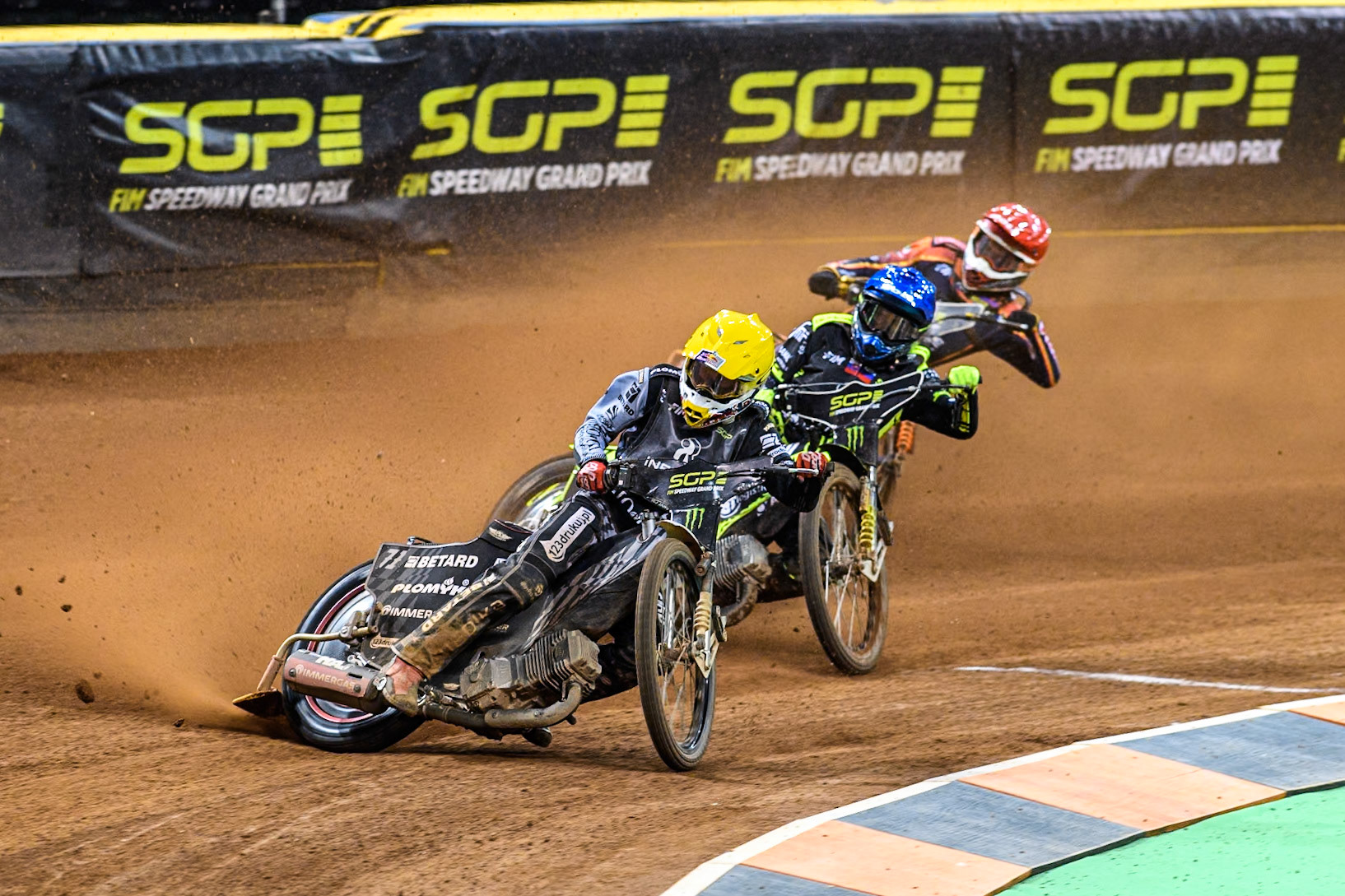 Maciej Janowski (71) of Poland in White leading Martin Vaculik (54) of Slovakia in Blue and Mikkel Michelsen (155) of Denmark in Red during the FIM Speedway Grand Prix of Great Britain at The Principality Stadium, Cardiff on Saturday 17th August 2024. (Photo: Ian Charles | MI News)