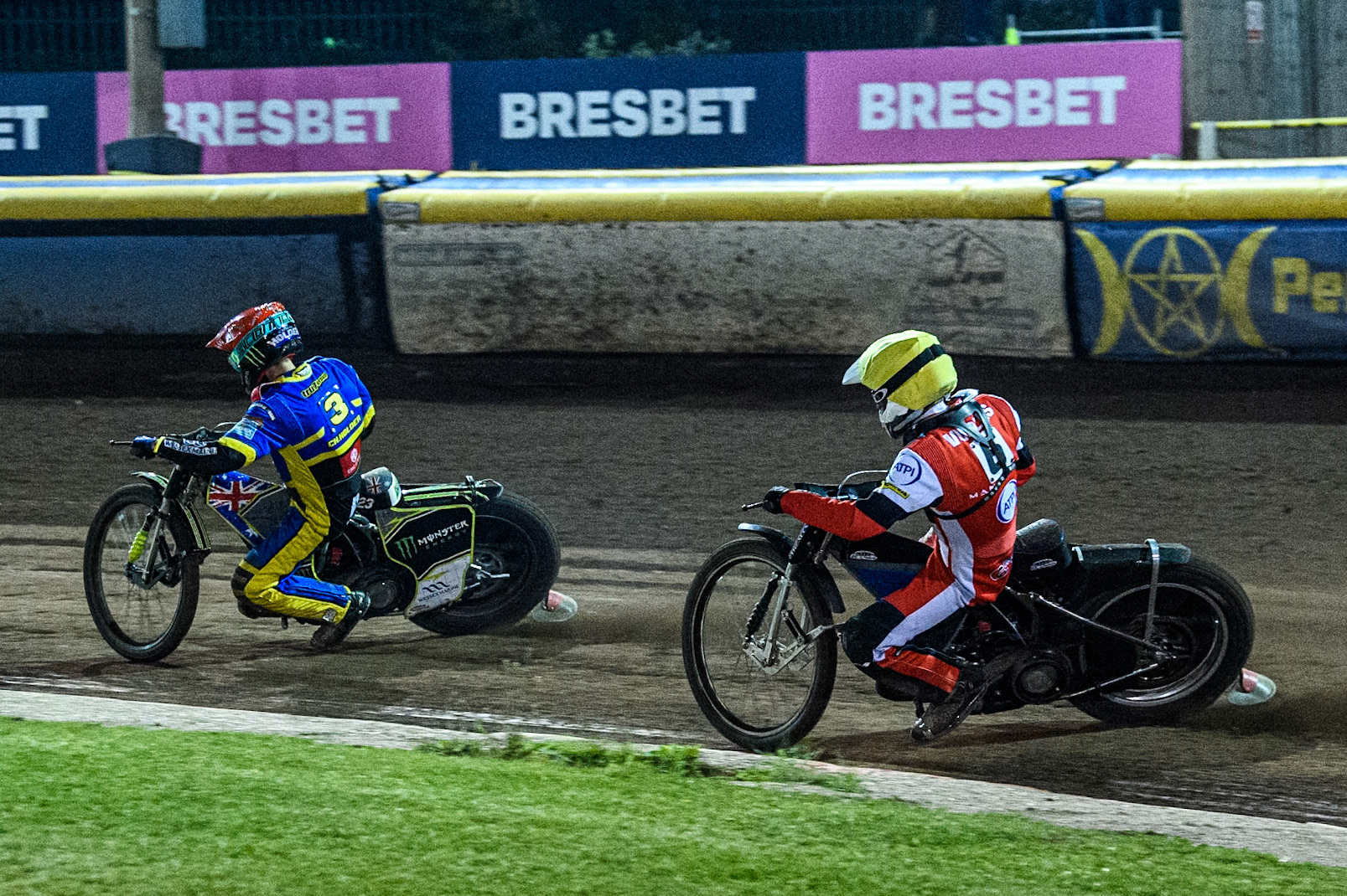 Belle Vue Aces' Antti Vuolas  in Yellow chases Sheffield Tigers' Chris Holder  in Red during the Rowe Motor Oil Premiership Play Off Semi Final 2nd leg between Sheffield Tigers and Belle Vue Aces at Owlerton Stadium, Sheffield on Thursday 19th September 2024. (Photo: Ian Charles | MI News)