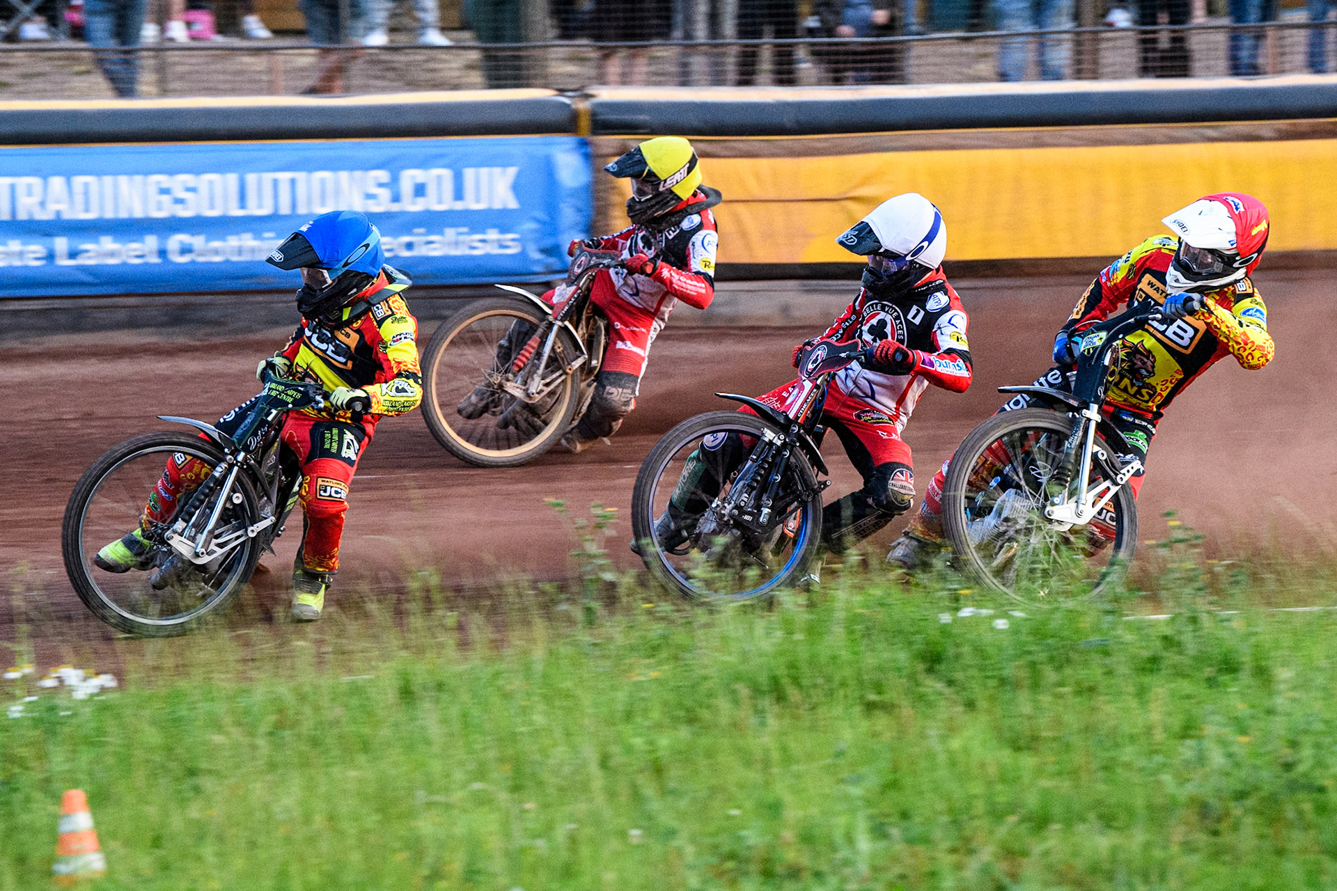 Leicester Lions' Craig Cook in Blue leading Belle Vue Aces' Brady Kurtz in White, Belle Vue Aces' Ben Cook in Yellow and Leicester Lions' Ryan Douglas in Red during the Rowe Motor Oil Premiership match between Leicester Lions and Belle Vue Aces at the Pidcock Motorcycles Arena, Leicester on Thursday 25th July 2024. (Photo: Ian Charles | MI News)
