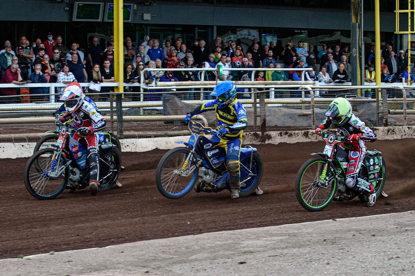 SHEFFIELD, UK. JULY 1ST     Charles Wright  (Yellow) inside Kyle Howarth  (Blue), Steve Worrall  (White) and Troy Batchelor  (Red) during the SGB Premiership match between Sheffield Tigers and Belle Vue Aces at Owlerton Stadium, Sheffield on Thursday 1st July 2021. (Credit: Ian Charles | MI News)