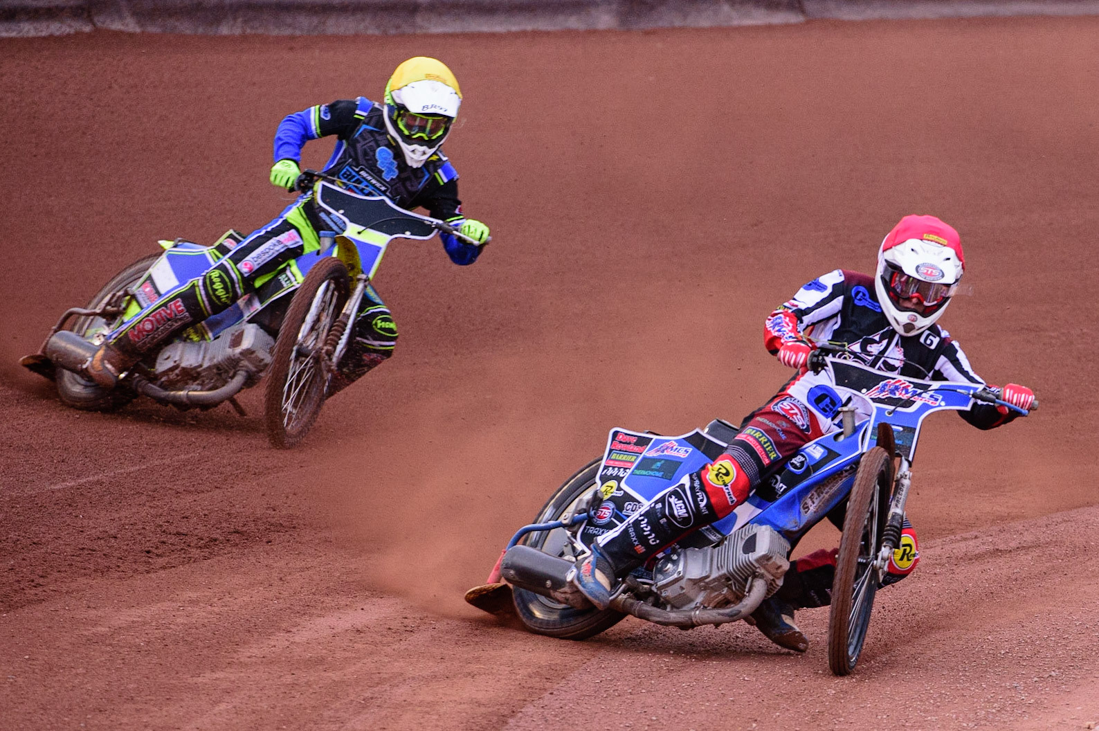 MANCHESTER, UK. JUN 24TH  Archie Freeman  (Red) inside Ben Rathbone  (Yellow)  during the National Development League match between Belle Vue Colts and Berwick Bullets at the National Speedway Stadium, Manchester on Friday 24th June 2022. (Credit: Ian Charles | MI News)