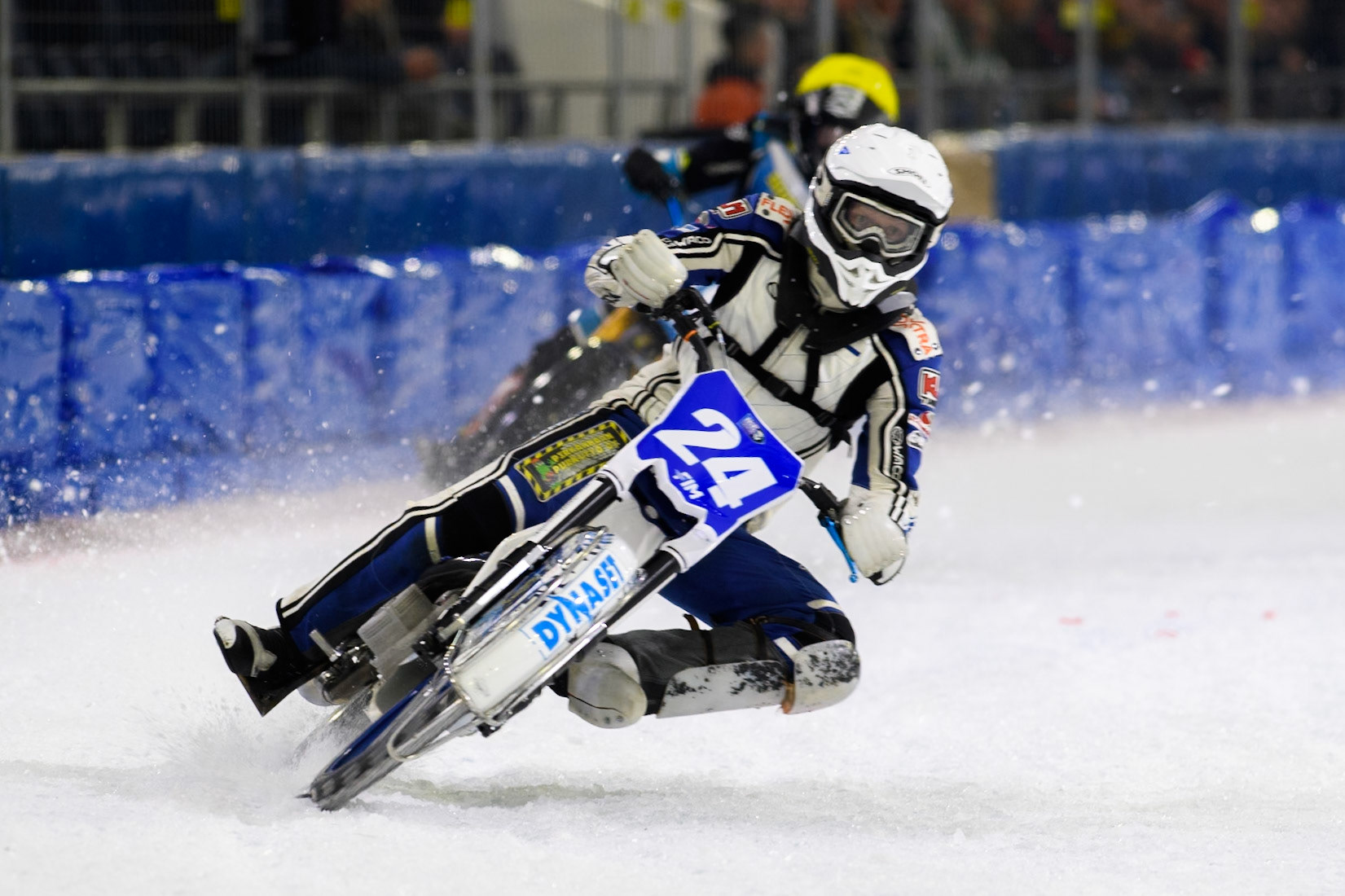 Max Koivula (24) of Finland in White leading Filip Jäger (719) of Sweden in Yellow during the FIM Ice Speedway Gladiators World Championship, Final 3 at the Ice Stadium, Thialf, Heerenveen on Saturday 5th April 2025. (Photo: Ian Charles | MI News)