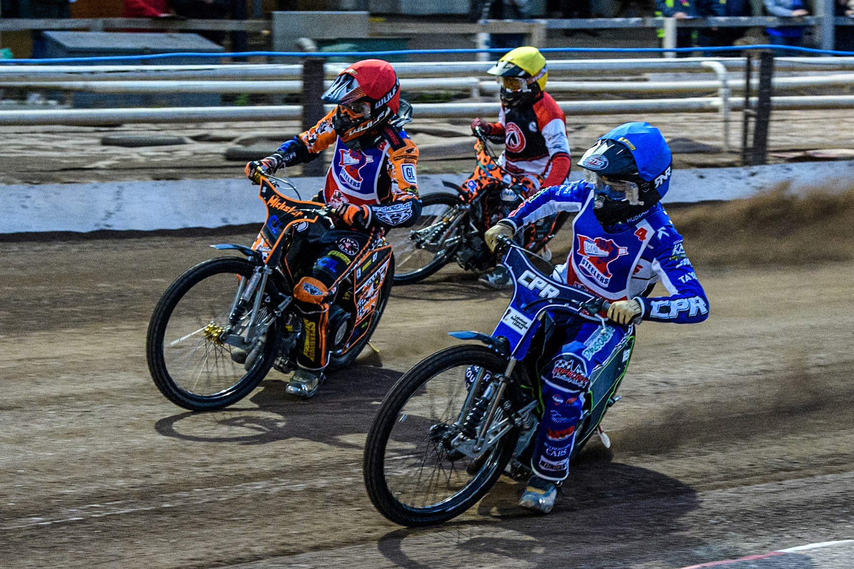 Steelers' Vinnie Foord in Blue rides inside Steelers' Mickie Simpson in Red and Belle Vue Colts' Guest Rider Cooper Rushen in Yellow during the WSRA National Development League match between Steelers and Belle Vue Colts at Owlerton Stadium, Sheffield on Monday 5th May 2025. (Photo: Ian Charles | MI News)