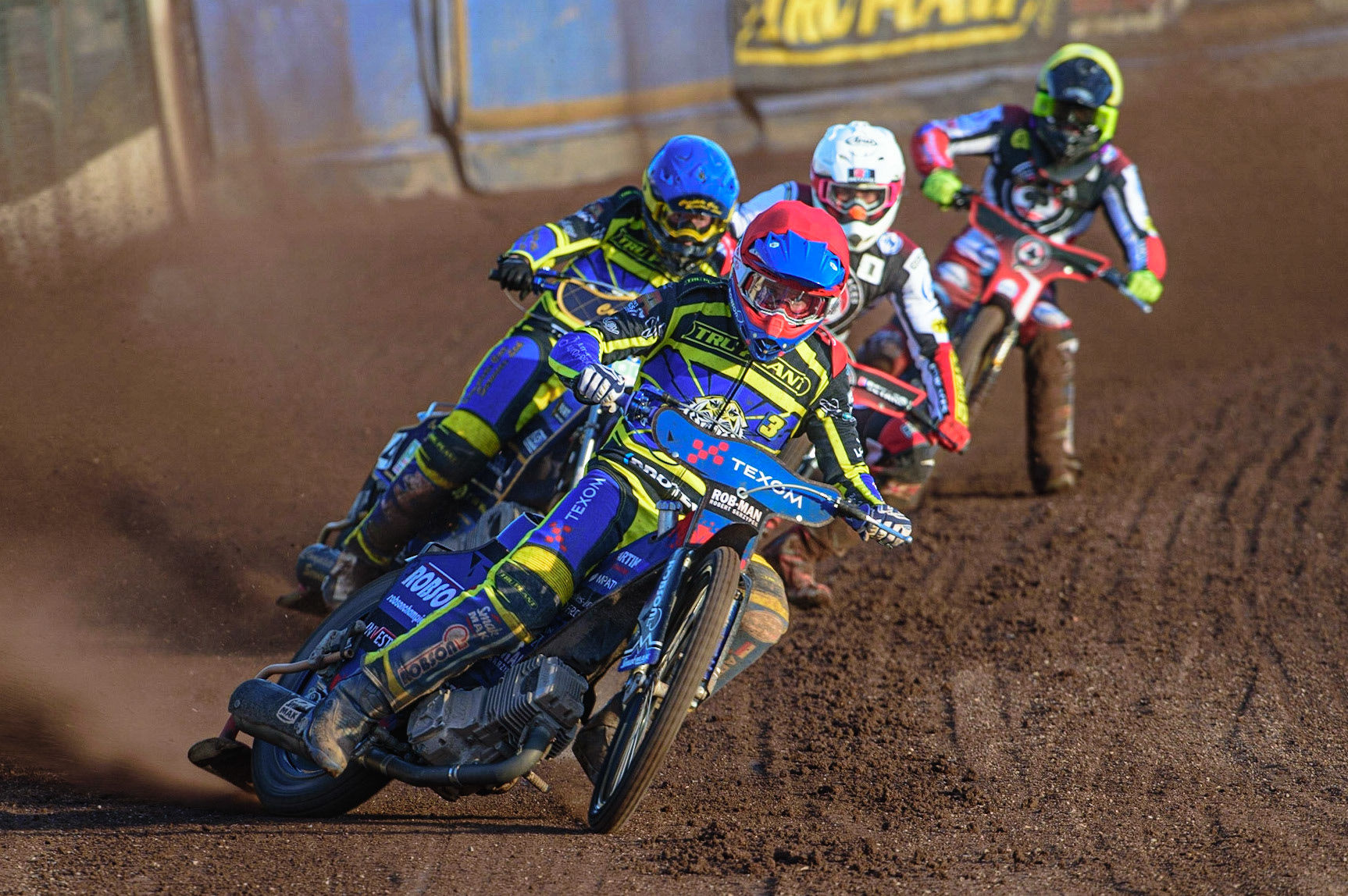 SHEFFIELD, UK. MAY 26TH Tobiasz Musielak  (Red) leads Kyle Howarth  (Blue) Max Fricke  (White) and Norick Blödorn  (Yellow)  during the SGB Premiership match between Sheffield Tigers and Belle Vue Aces at Owlerton Stadium, Sheffield on Thursday 26th May 2022. (Credit: Ian Charles | MI News)