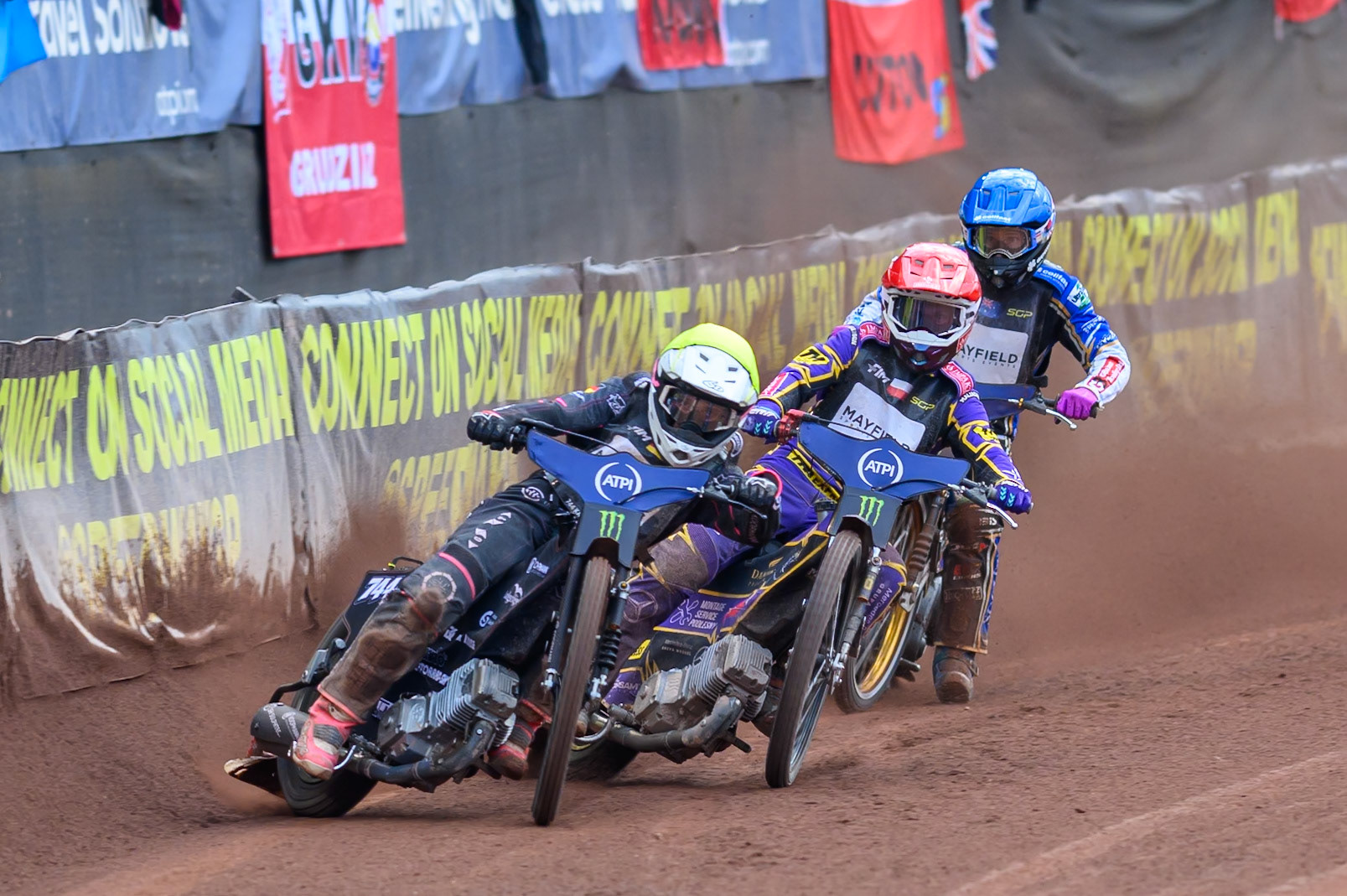 Kai Huckenbeck (744) of Germany in Yellow leading Kacper Woryna (223) of Poland in Red and Jason Doyle (69) of Australia in Blue during the ATPI  FIM Speedway GP of Manchester at the National Speedway Stadium, Manchester on Saturday 6th June 2026. (Photo: Ian Charles | MI News)