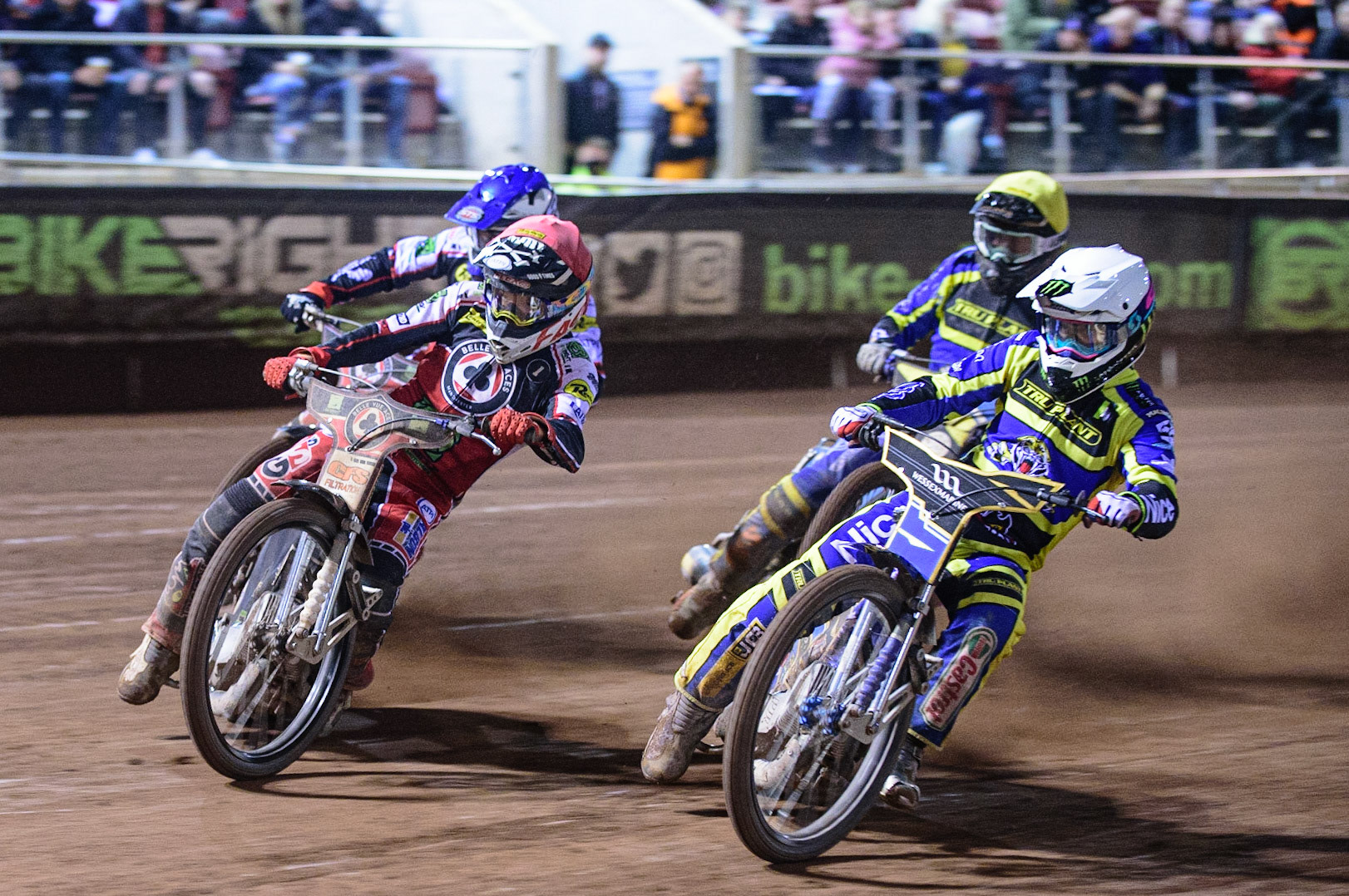MANCHESTER, UK. OCT 7TH  The final heat as Dan Bewley  (Red) and Richie Worrall  (Blue) leads Jack Holder  (White) and Adam Ellis  (Yellow) during the SGB Premiership Play off Semi-Final Second Leg between Belle Vue Aces and Sheffield Tigers at the National Speedway Stadium, Manchester on Thursday 7th October 2021. (Credit: Ian Charles | MI News)