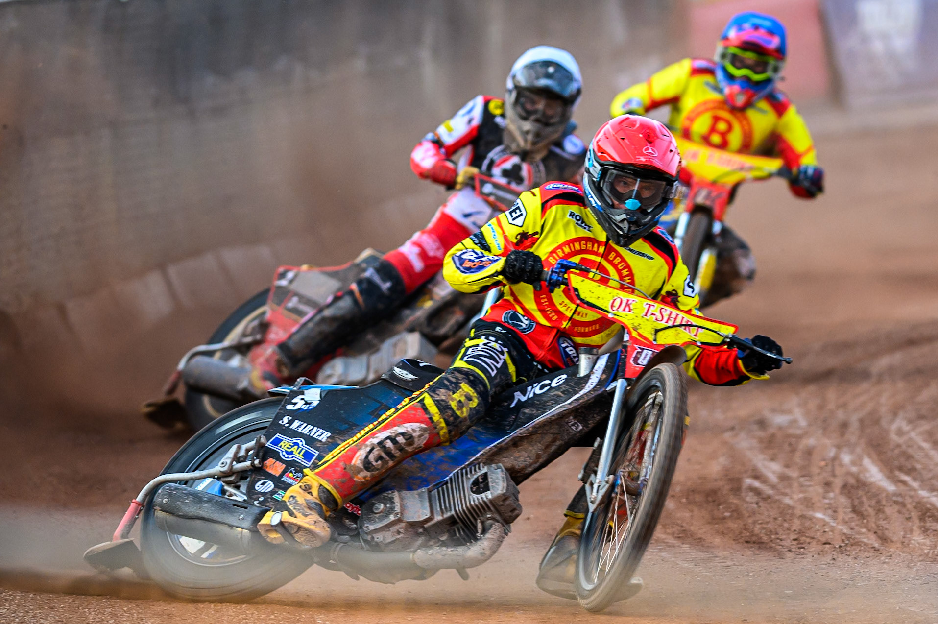 Birmingham Brummies' Matej Zagar in Red leading Belle Vue Aces' Norick Blodorn in White and Birmingham Brummies' Jonas Jeppesen in Blue during the Rowe Motor Oil Premiership match between Birmingham Brummies and Belle Vue Aces at Perry Bar Stadium, Birmingham on Monday 2nd June 2025. (Photo: Ian Charles | MI News)