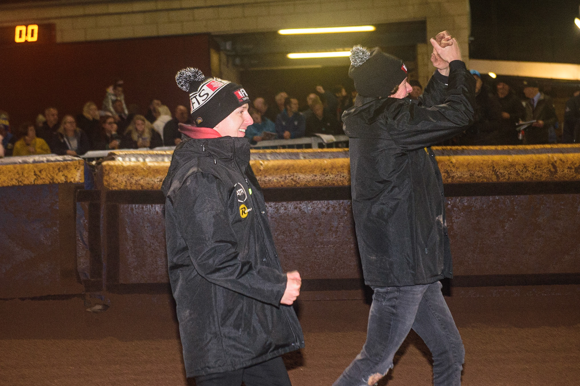 Jye Etheridge (left) and Charles Wright join the celebrations during the SGB Premiership Grand Final 2nd Leg between Sheffield Tigers and Belle Vue Aces at Owlerton Stadium, Sheffield on Thursday 13th October 2022. (Credit: Ian Charles | MI News)