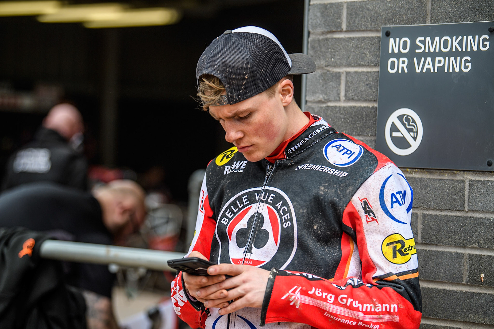 Norick Blödorn of Belle Vue Aces has a check of his phone during the Rowe Motor Oil Premiership match between Belle Vue Aces and Sheffield Tigers at the National Speedway Stadium, Manchester on Monday 5th May 2025. (Photo: Ian Charles | MI News)