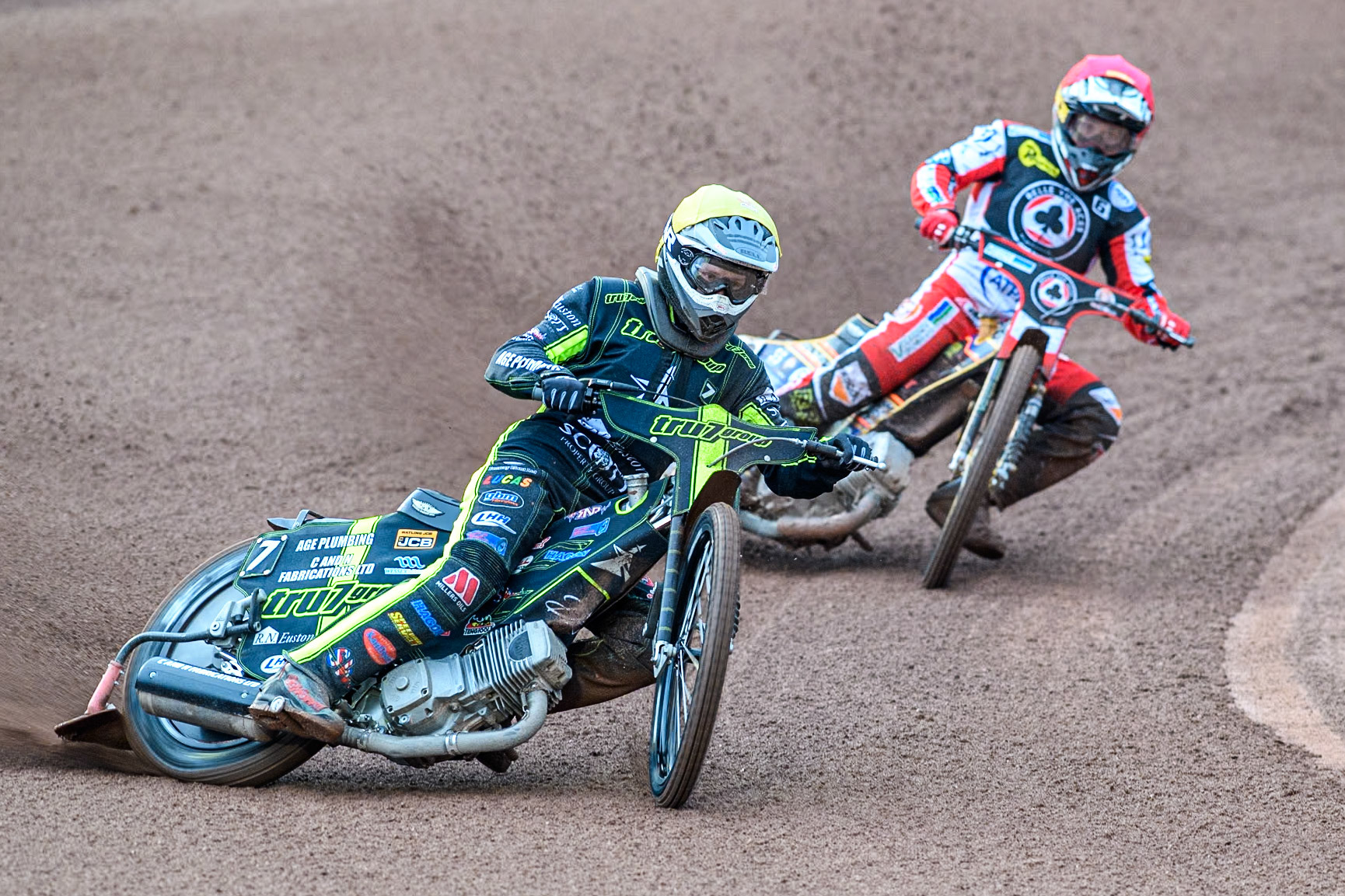 Ipswich Witches' Dan Thompson in Yellow leading Belle Vue Aces' Connor Mountain in Red during the Rowe Motor Oil Premiership match between Belle Vue Aces and Ipswich Witches at the National Speedway Stadium, Manchester on Monday 22nd April 2024. (Photo: Ian Charles | MI News)