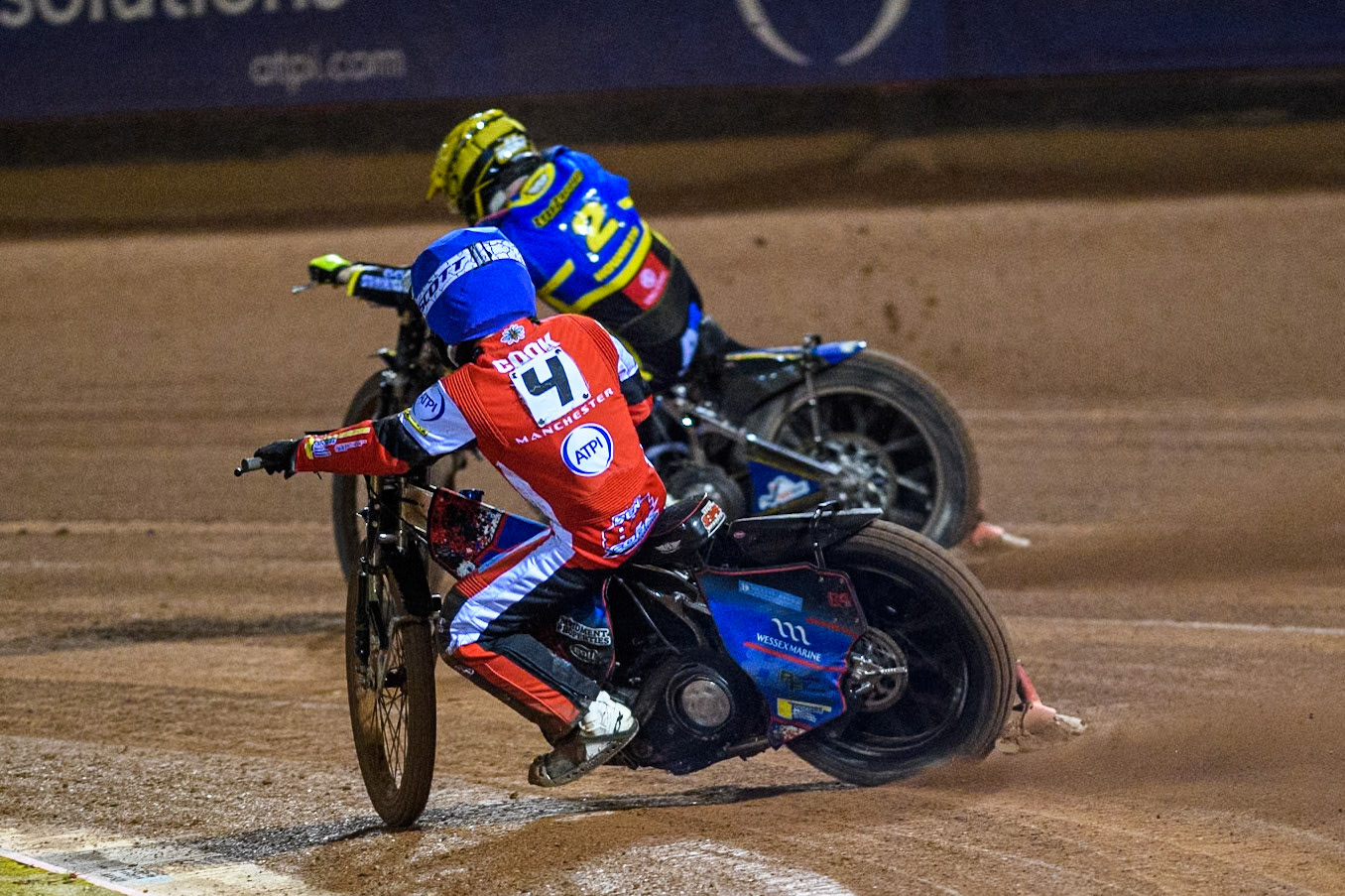 Belle Vue Aces' Ben Cook  in Blue chases Sheffield Tigers' Kyle Howarth  in Yellow during the Rowe Motor Oil Premiership Play Off Semi Final 2, 1st Leg match between Belle Vue Aces and Sheffield Tigers at the National Speedway Stadium, Manchester on Monday 16th September 2024. (Photo: Ian Charles | MI News)