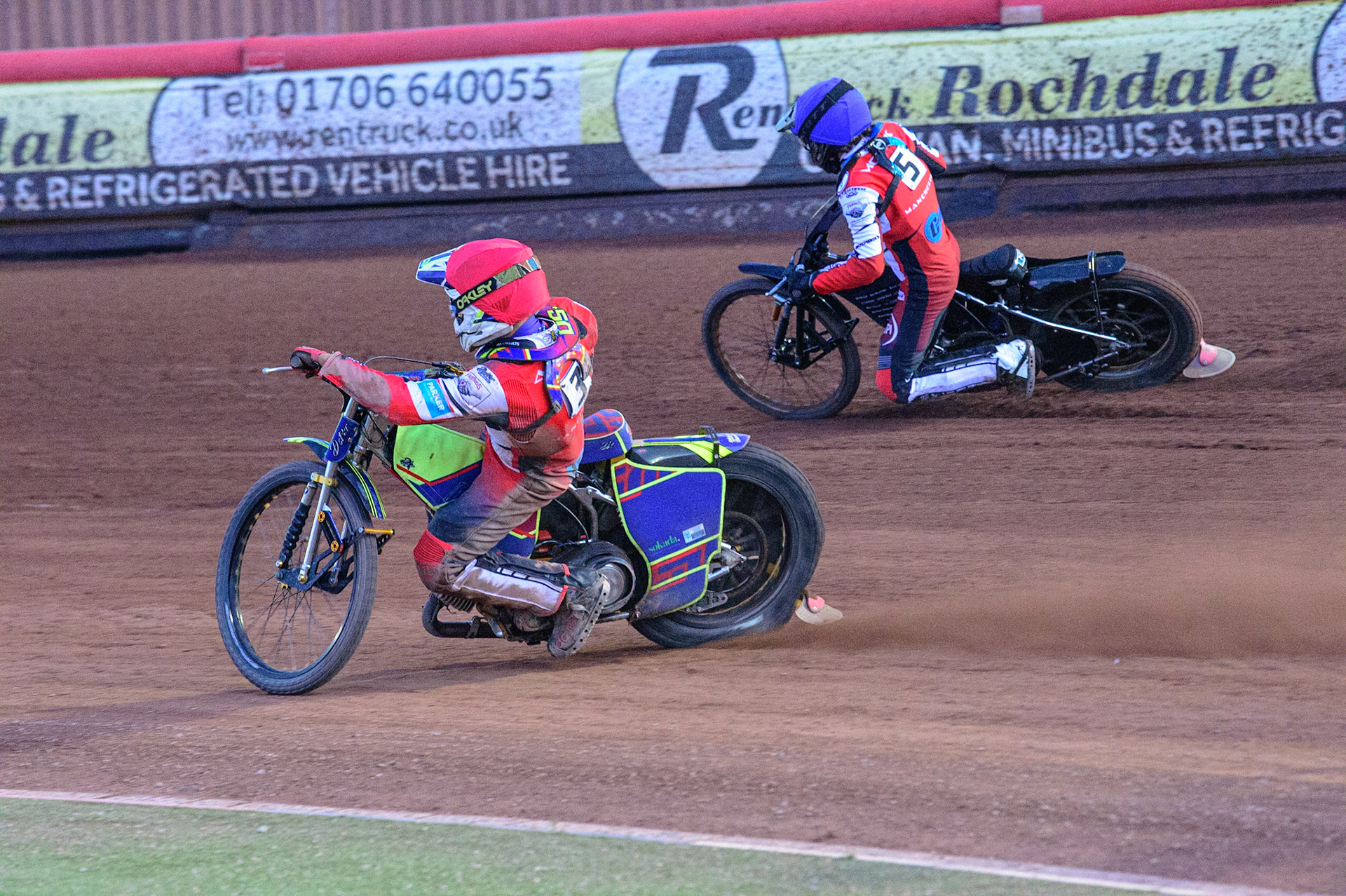 Belle Vue Cool Running Colts  riders Nathan Ablitt   (Red) and Harry McGurk  (Blue) go for maximum heat points during the National Development League match between Belle Vue Colts and Mildenhall Fens Tigers at the National Speedway Stadium, Manchester on Friday 15th July 2022. (Credit: Ian Charles | MI News)