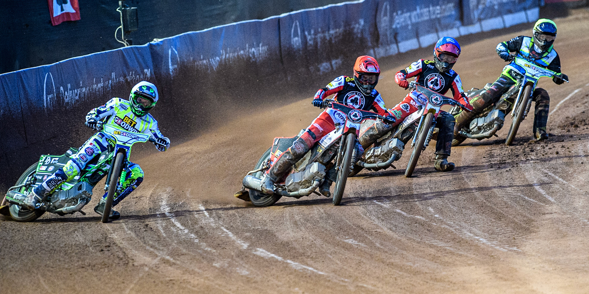(L to R) Oxford Spires' Charles Wright in White, Belle Vue Aces' Zack Cook in Red, Belle Vue Aces' Tate Zischke in Blue and Oxford Spires' Guest Rider Dan Thompson in Yellow during the Rowe Motor Oil Premiership match between Belle Vue Aces and Oxford Spires at the National Speedway Stadium, Manchester on Monday 14th April 2025. (Photo: Ian Charles | MI News)
