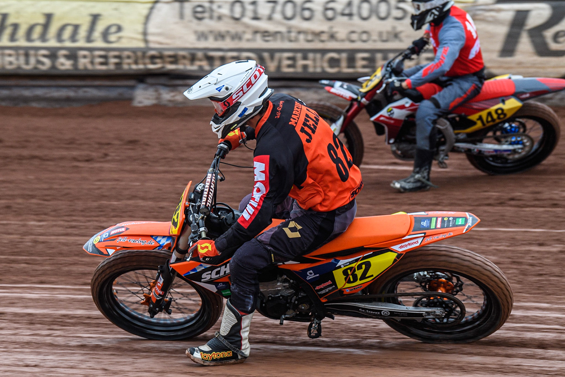 Markus Jell (82) from Germany inside Vittorio Emanuele Marzotto (148) from Italy during practice during the FIM World Flat Track Championship Round 1 at the National Speedway Stadium, Manchester on Saturday 5th August 2023. (Photo: Ian Charles | MI News)