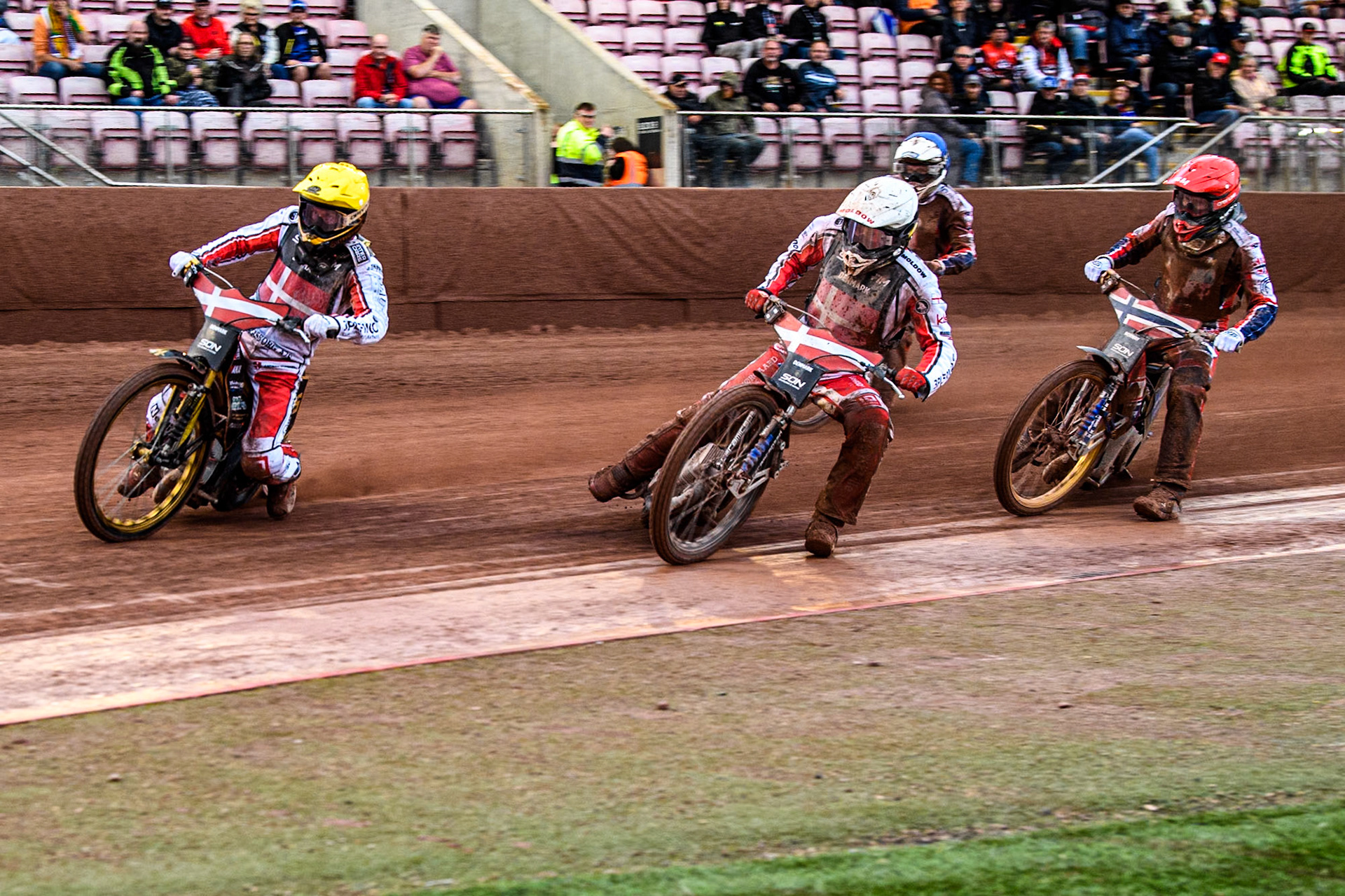 Norway v Denmark: Anders Thomsen of Denmark in Yellow rides outside Rasmus Jensen of Denmark in White with Mathias Pollestad of Norway in Red and Truls Kamhaug of Norway in Blue behind during the Monster Energy FIM Speedway of Nation Semi Final 2 at the National Speedway Stadium, Manchester on Wednesday 10th July 2024. (Photo: Ian Charles | MI News)