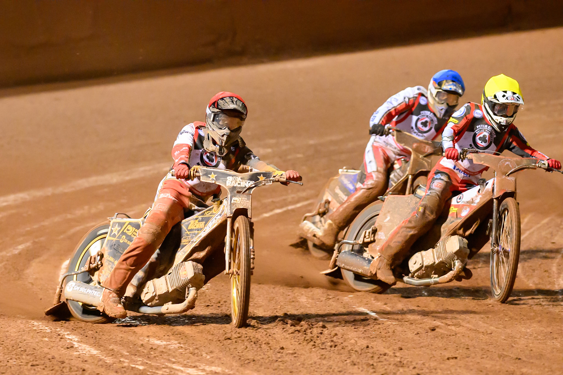 Norick Blodorn  rides outside Zach Cook  in Yellow and Rasmus Jensen  in Blue during the Peter Craven Memorial Trophy at the National Speedway Stadium, Manchester, on Monday 16th March 2026. (Photo: Ian Charles | MI News)