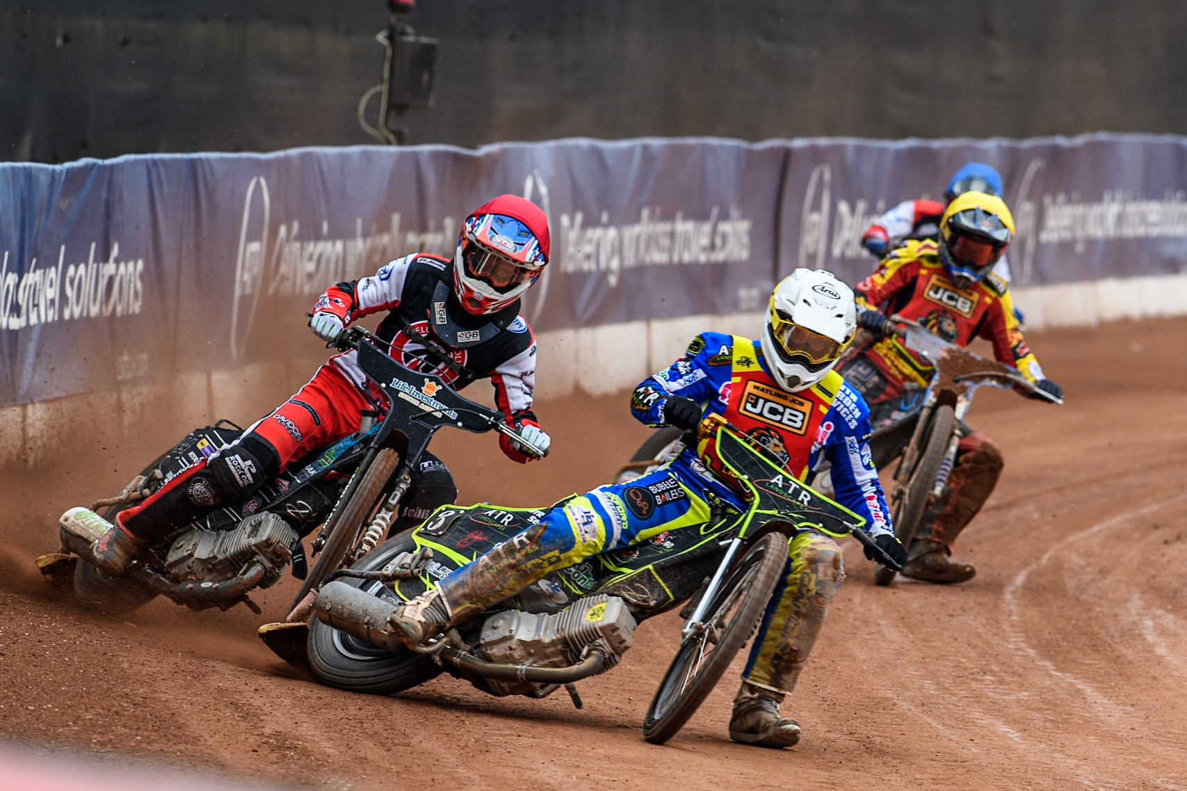 Leicester Lion Cubs' Guest Rider Darryl Ritchings in White leading Belle Vue Colts' Freddy Hodder in Red Leicester Lion Cubs' Sonny Springer in Yellow and Belle Vue Colts' Harry Fletcher in Blue during the WSRA National Development League match between Belle Vue Colts and Leicester Lion Cubs at the National Speedway Stadium, Manchester on Friday 18th April 2025. (Photo: Ian Charles | MI News)