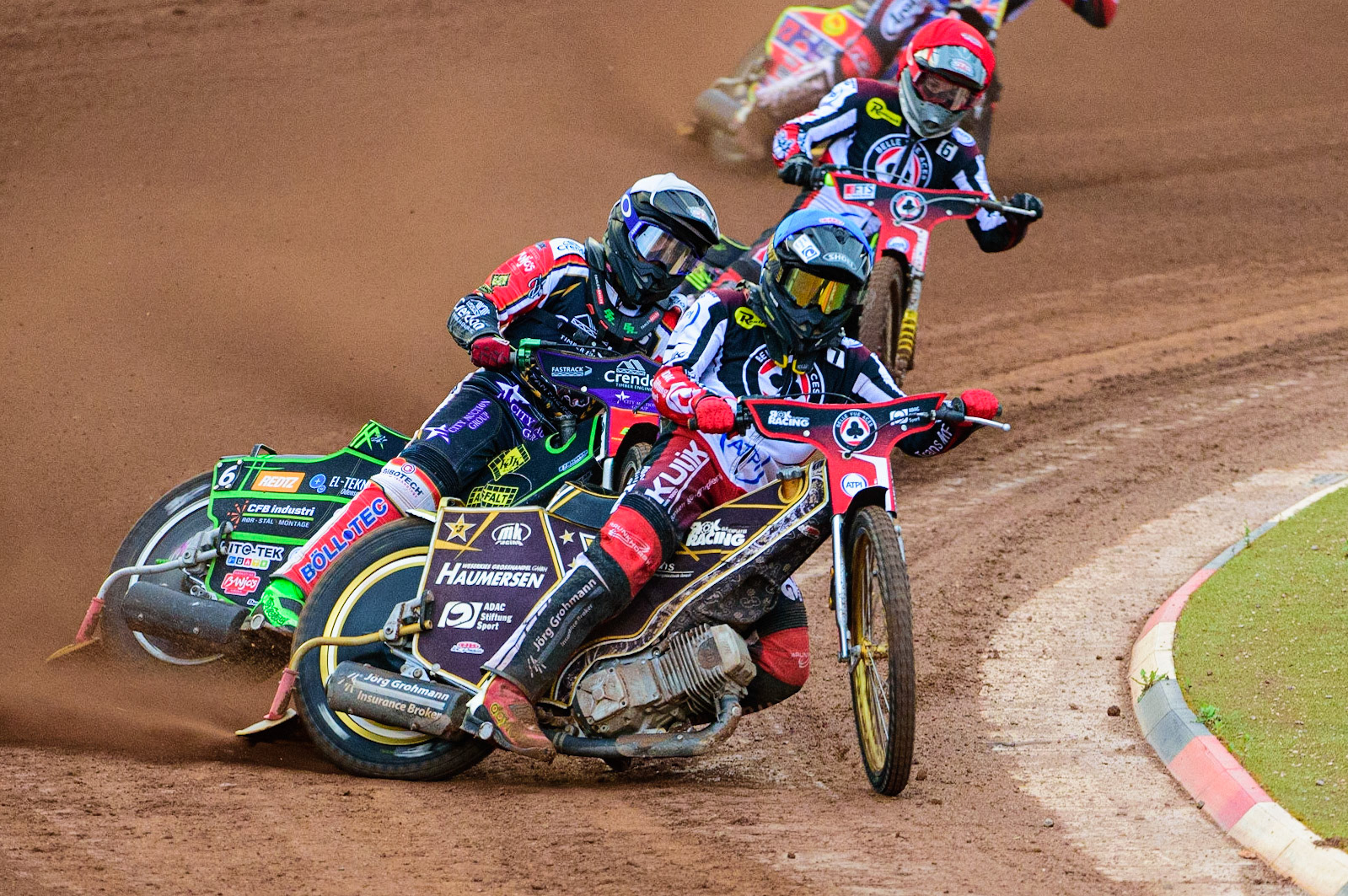 Norick Blödorn  (Blue) blocks Benjamin Basso  (White) with Jye Etheridge  (Red) behind during the SGB Premiership match between Belle Vue Aces and Peterborough at the National Speedway Stadium, Manchester on Monday 25th July 2022. (Credit: Ian Charles | MI News