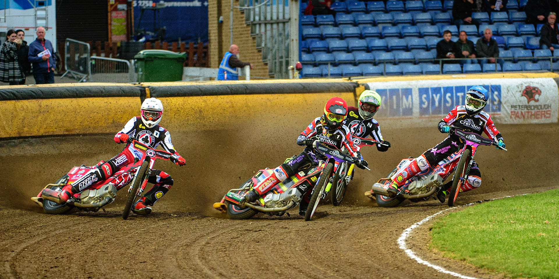 PETERBOROUGH, UK. MAY 9TH  Michael Palm Toft  (Red) leadsMax Fricke  (White), Jye Etheridge  (Yellow) and Scott Nicholls (Blue) during the SGB Premiership match between Peterborough Panthers and Belle Vue Aces at East of England Showground, Peterborough on Monday 9th May 2022. (Credit: Ian Charles | MI News)