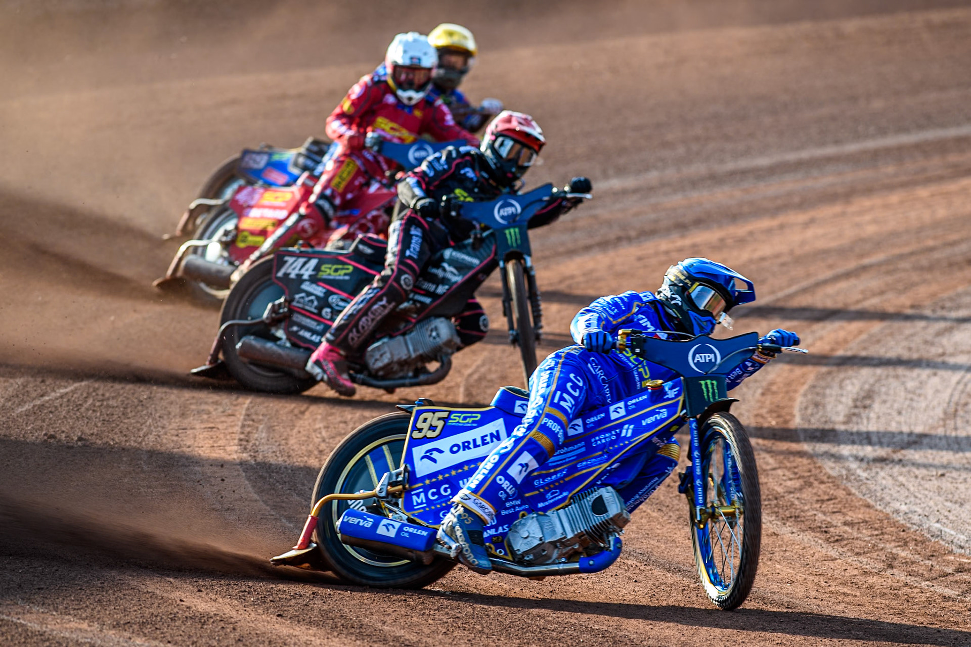 Bartosz Zmarzlik (95) of Poland in Blue leading Kai Huckenbeck (744) of Germany in Red Max Fricke (46) of Australia in White and Jason Doyle (69) of Australia in Yellow during the ATPI FIM Speedway Grand Prix Round 5 at the National Speedway Stadium, Manchester, on Saturday 14th June 2025. (Photo: Ian Charles | MI News)