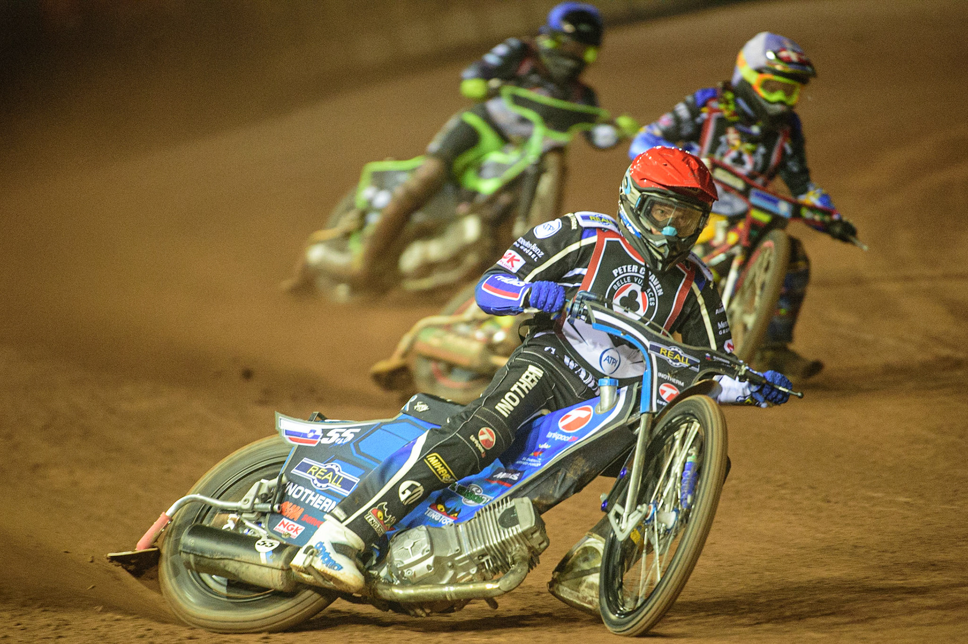 MANCHESTER, UK. MAR 21ST. Matej Žagar  (Red) leads Michael Palm-Toft (White) and Tom Brennan (Blue) during the ATPI Peter Craven Memorial Trophy at the National Speedway Stadium, Manchester on Monday 21st March 2022. (Credit: Ian Charles | MI News)