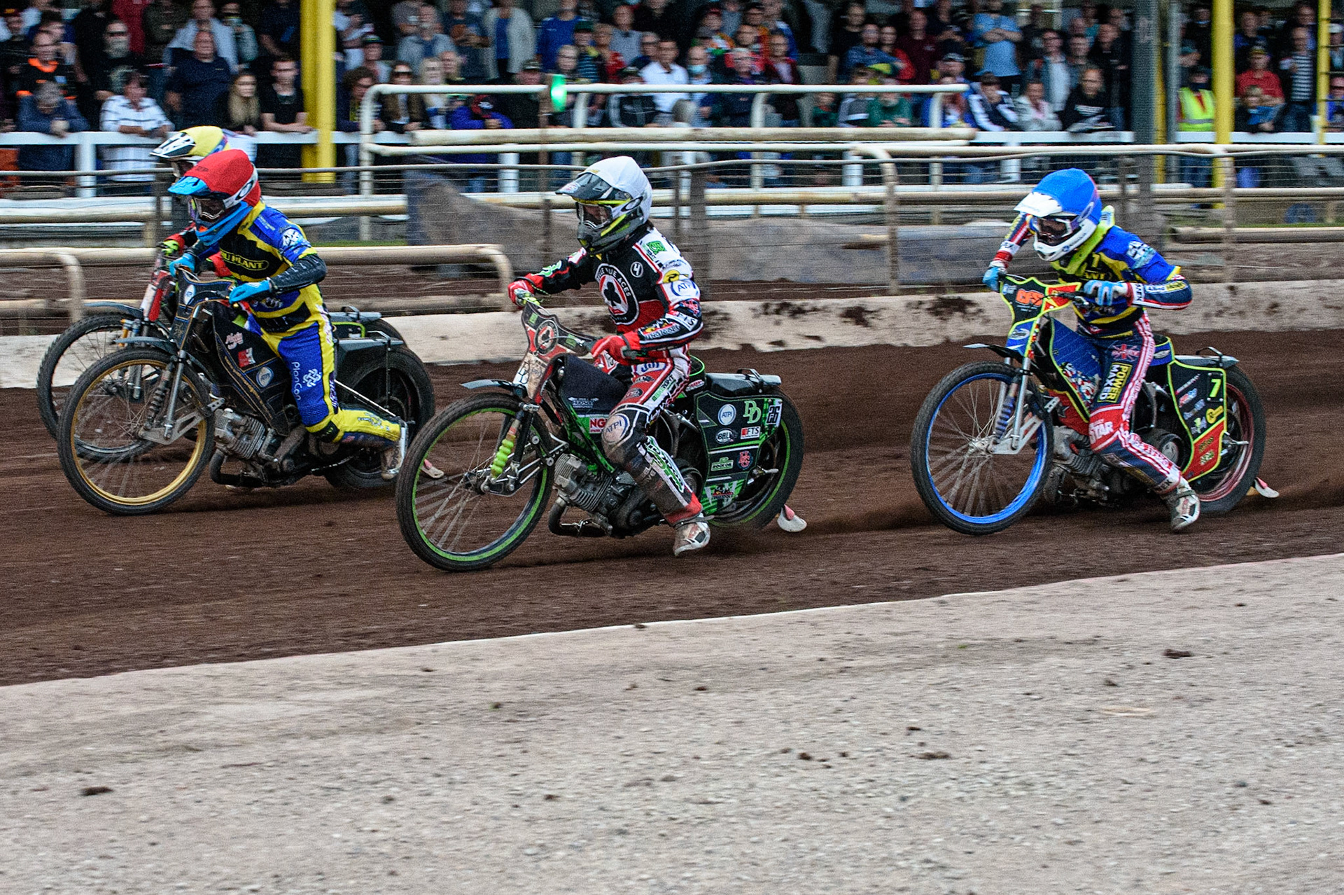 SHEFFIELD, UK. JULY 1ST     Charles Wright  (White) inside Justin Sedgmen (Red)  and Tom Brennan  (Yellow) with Anders Rowe  (Blue) behind during the SGB Premiership match between Sheffield Tigers and Belle Vue Aces at Owlerton Stadium, Sheffield on Thursday 1st July 2021. (Credit: Ian Charles | MI News)